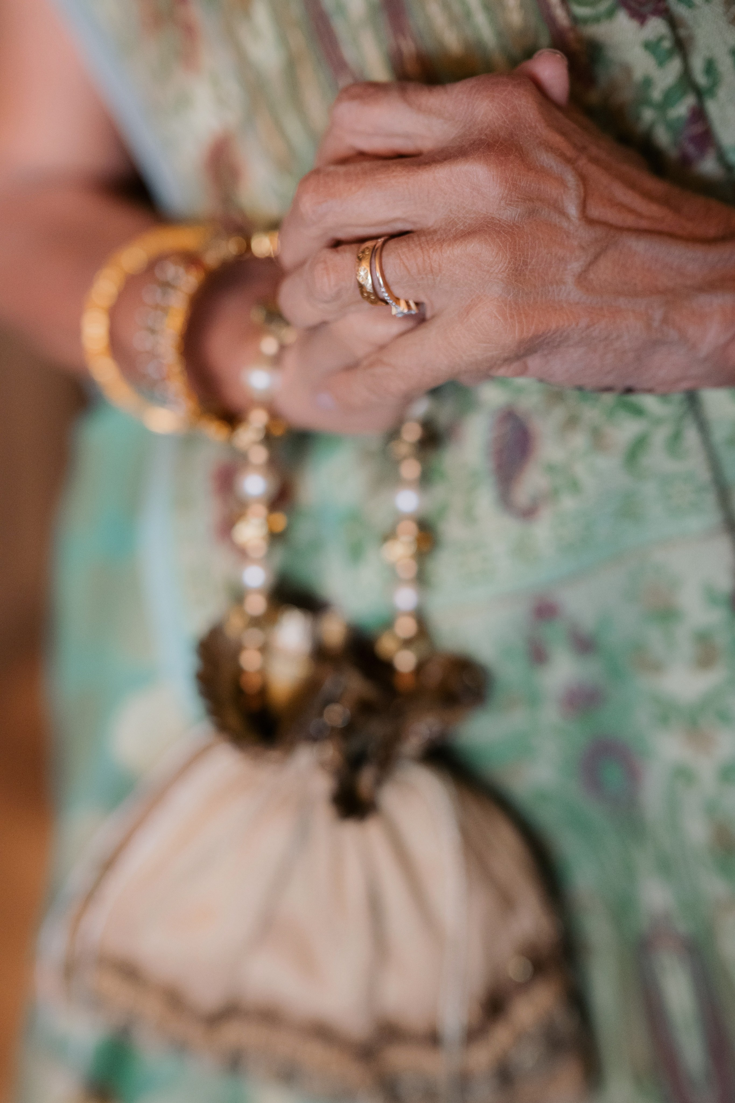 a woman in a dress holding a purse
