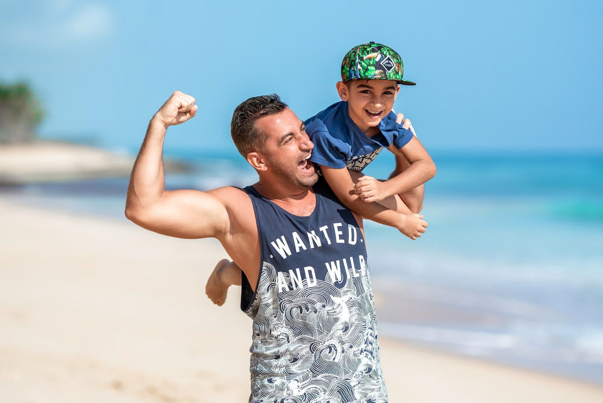 Best Punta Cana photographer creating beautiful family photography by the ocean.