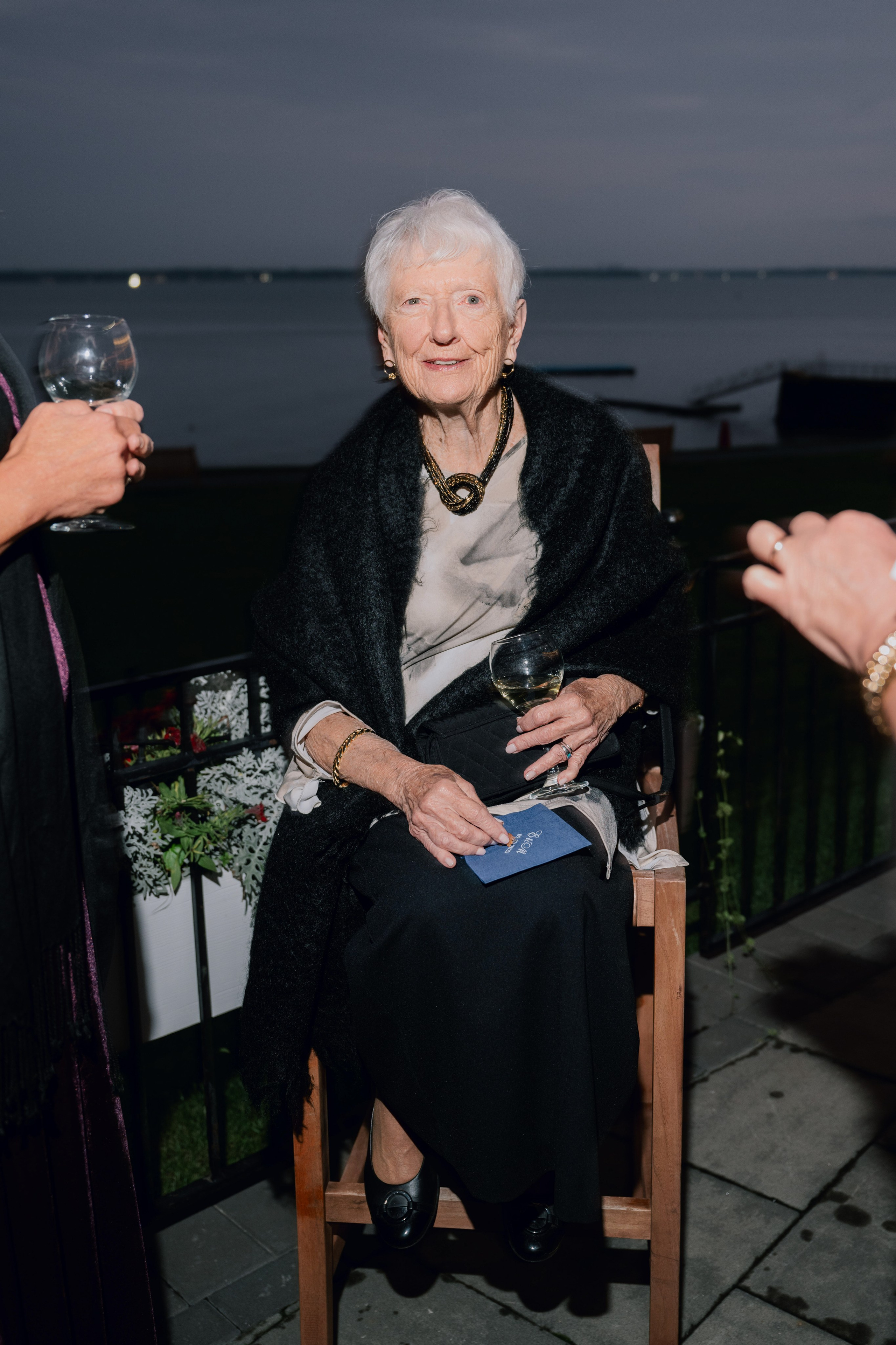 a woman sitting on a chair