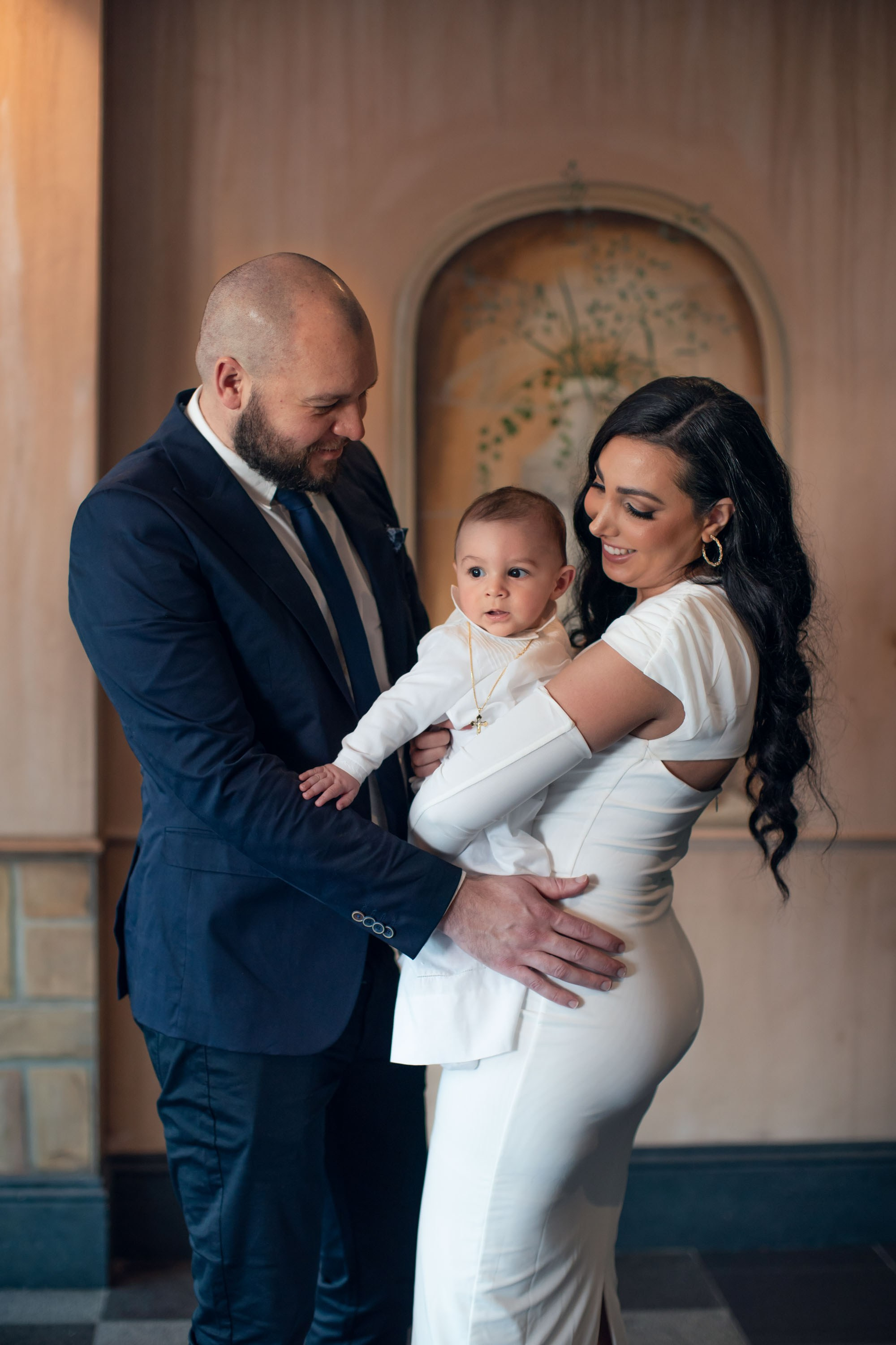 christening photography Sydney, baptism photographer Sydney, baby christening photos, family photographer Sydney, natural light christening photos, church christening photography, reception photography, candid family moments, christening day storytelling, full christening photoshoot experience