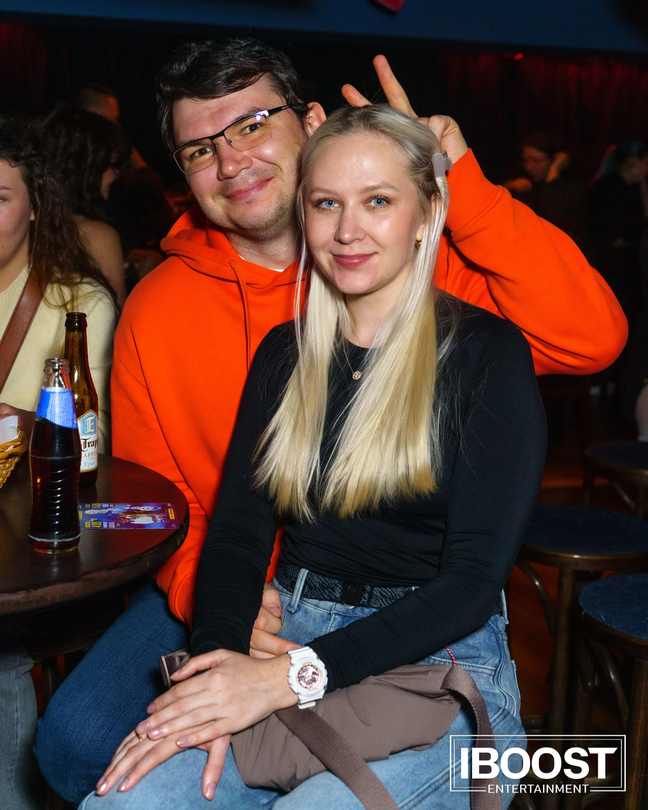 Young couple smiling for the camera at the Animal JazZ concert in Sofia.