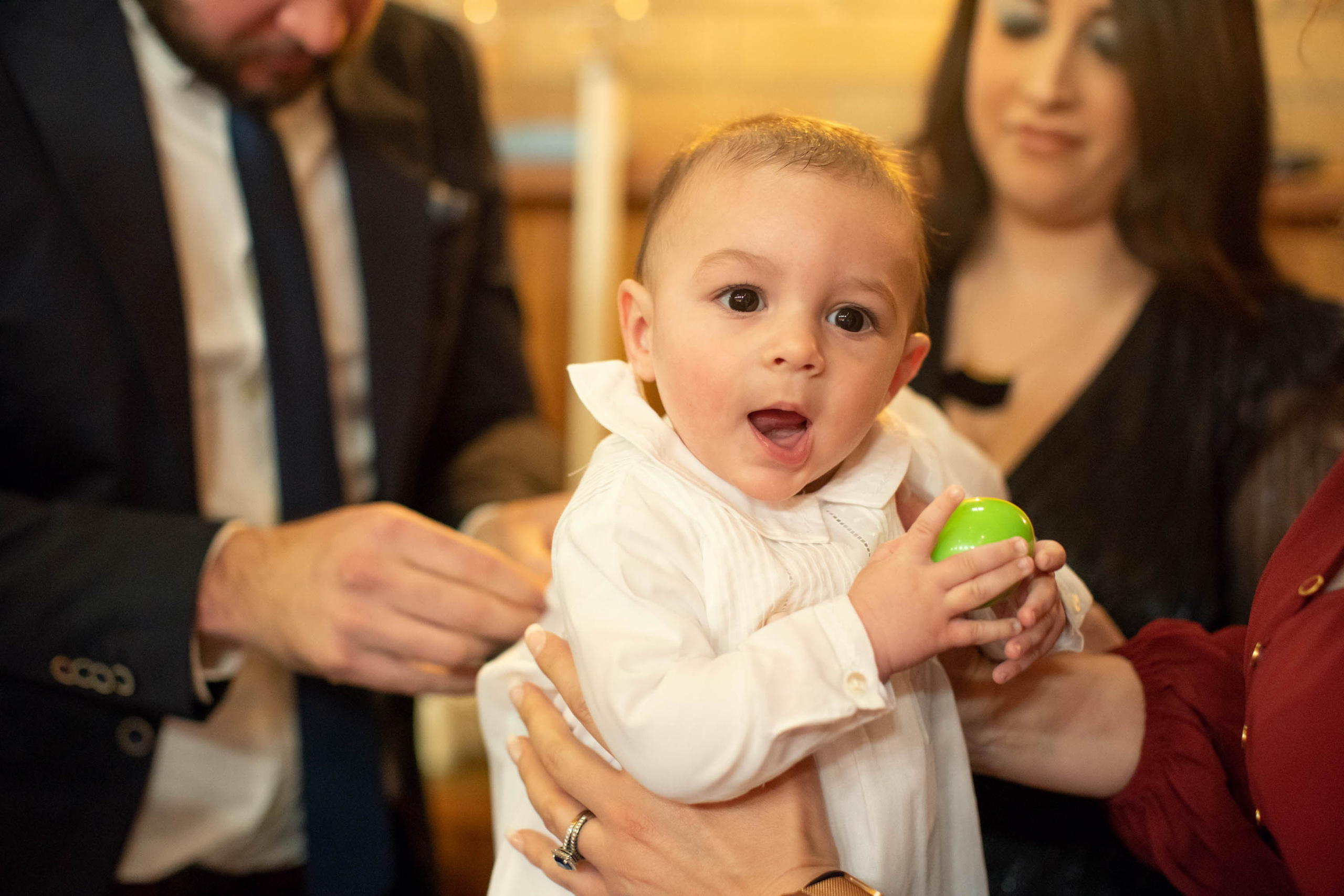 christening photography Sydney, baptism photographer Sydney, baby christening photos, family photographer Sydney, natural light christening photos, church christening photography, reception photography, candid family moments, christening day storytelling, full christening photoshoot experience