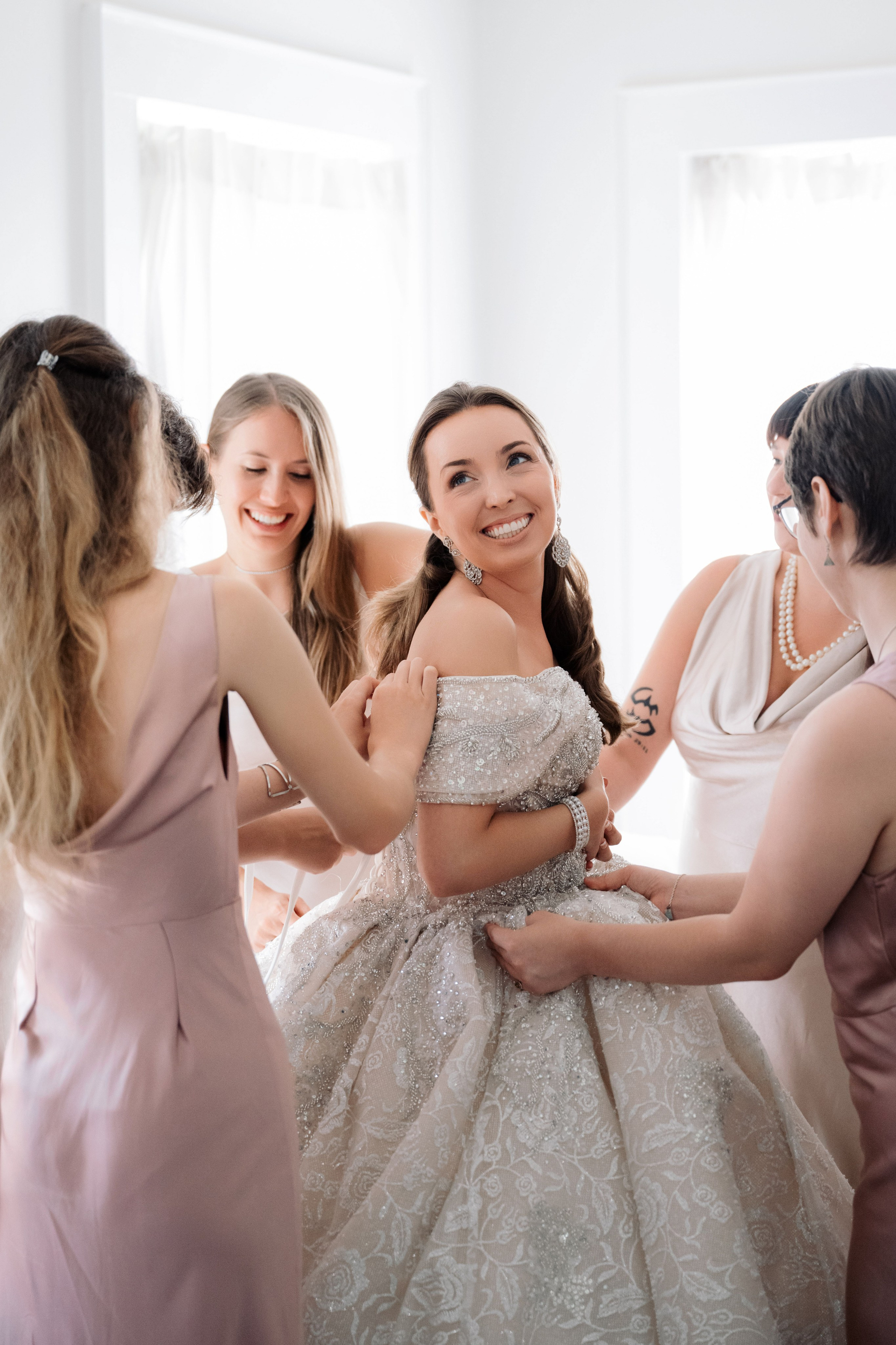 bridesmaids getting ready for her wedding
