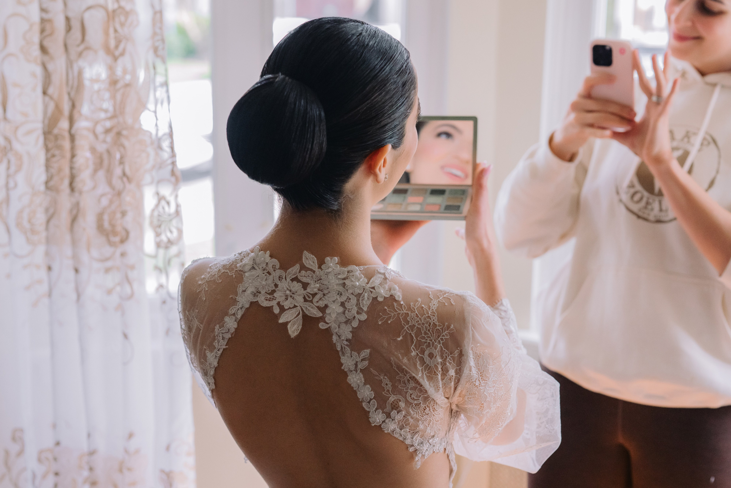 a woman is taking a picture of herself