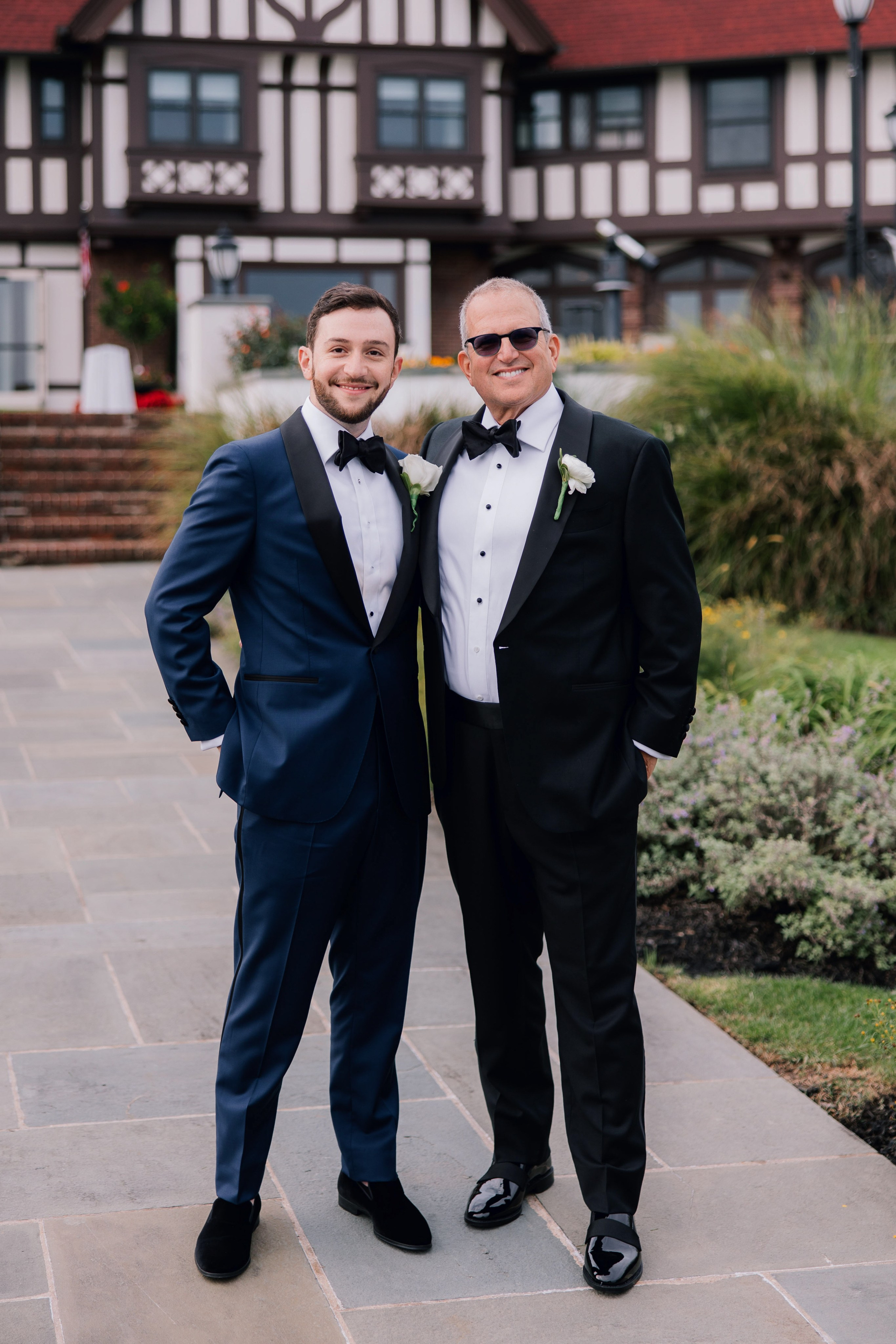 two men in tuxed suits