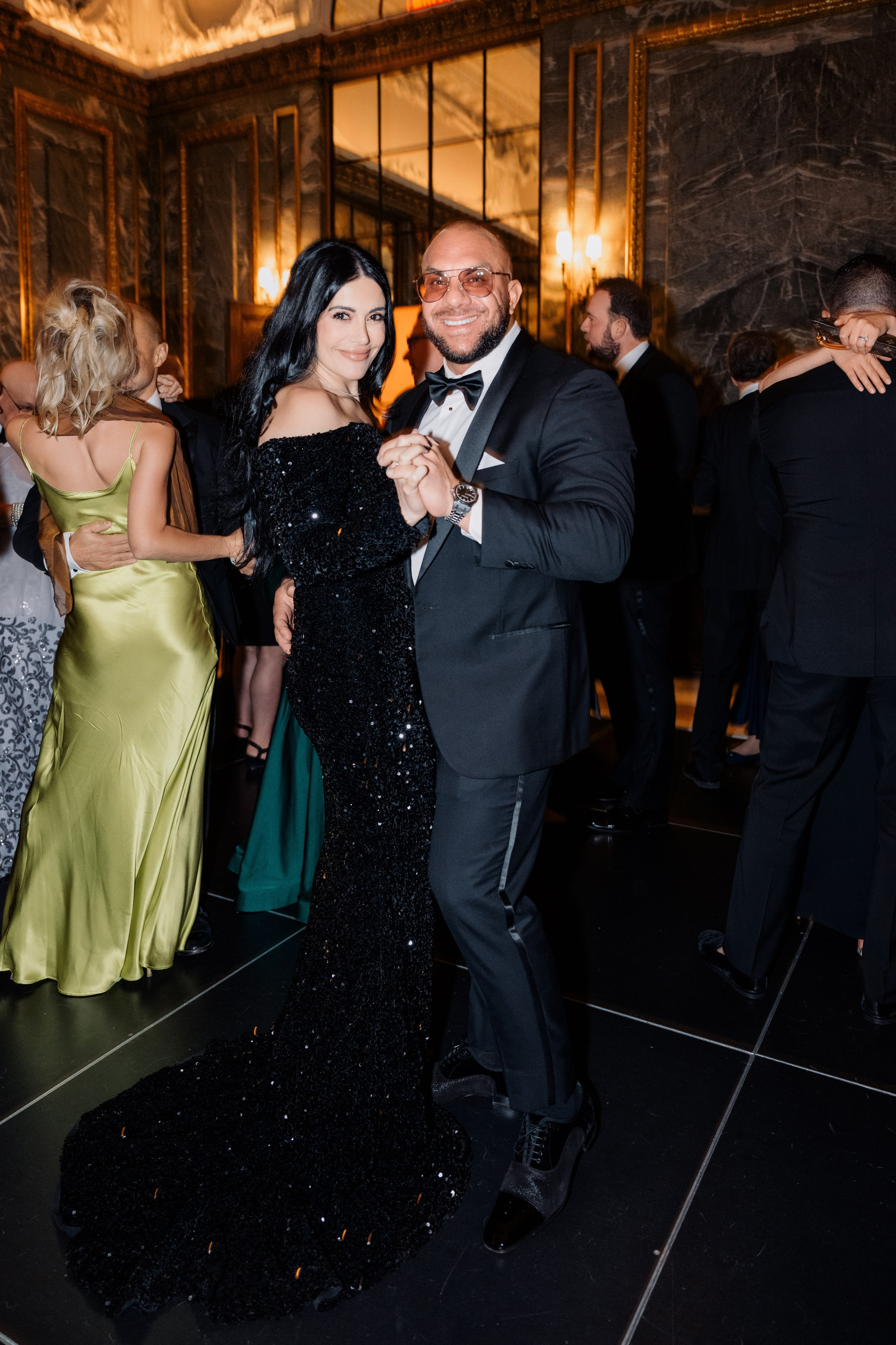 a man and woman dancing on a dance floor