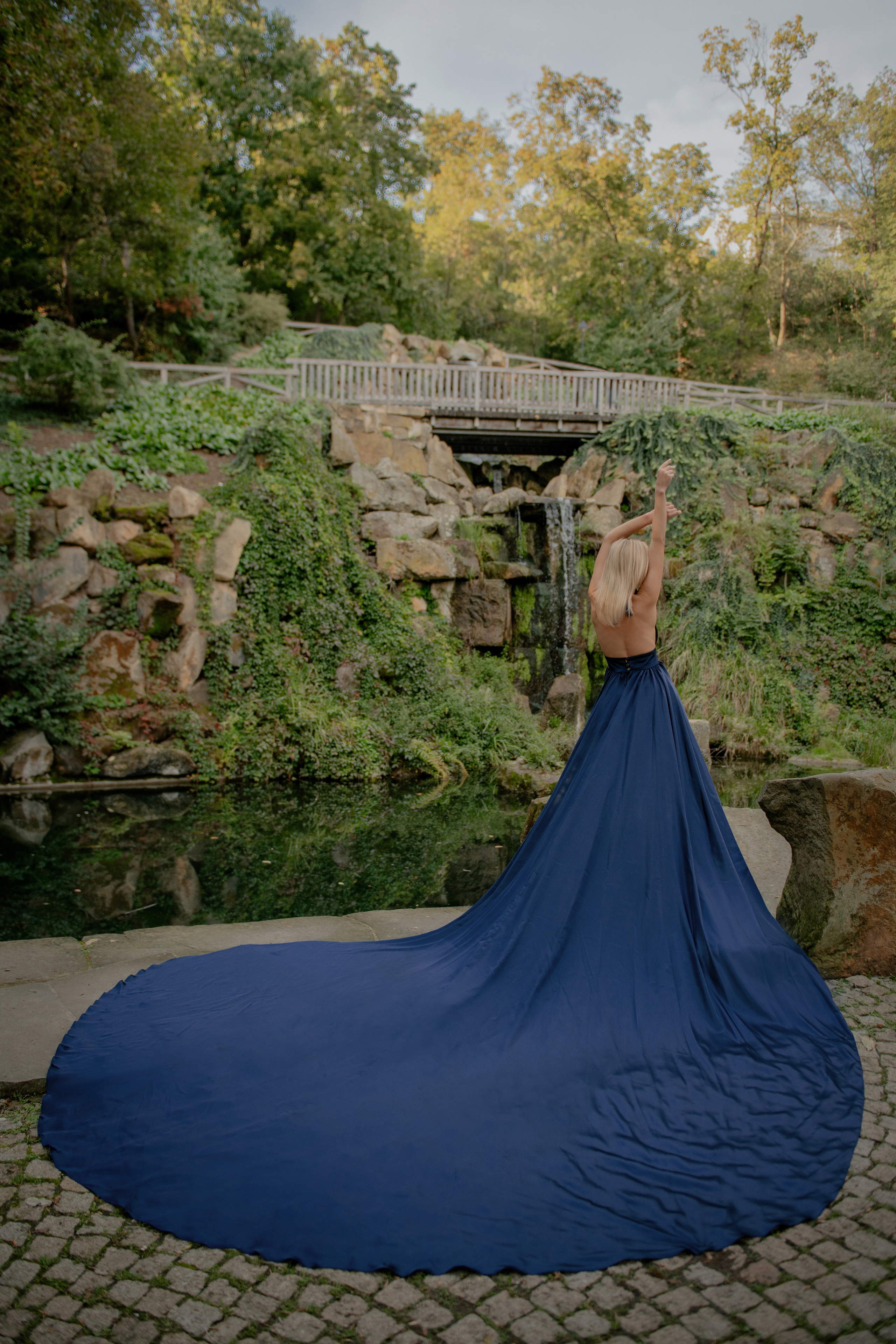Portrait photoshoot in gorgeous dress in Kinský garden in Prague. Professional photographer in Prague Anastasia Haritonova