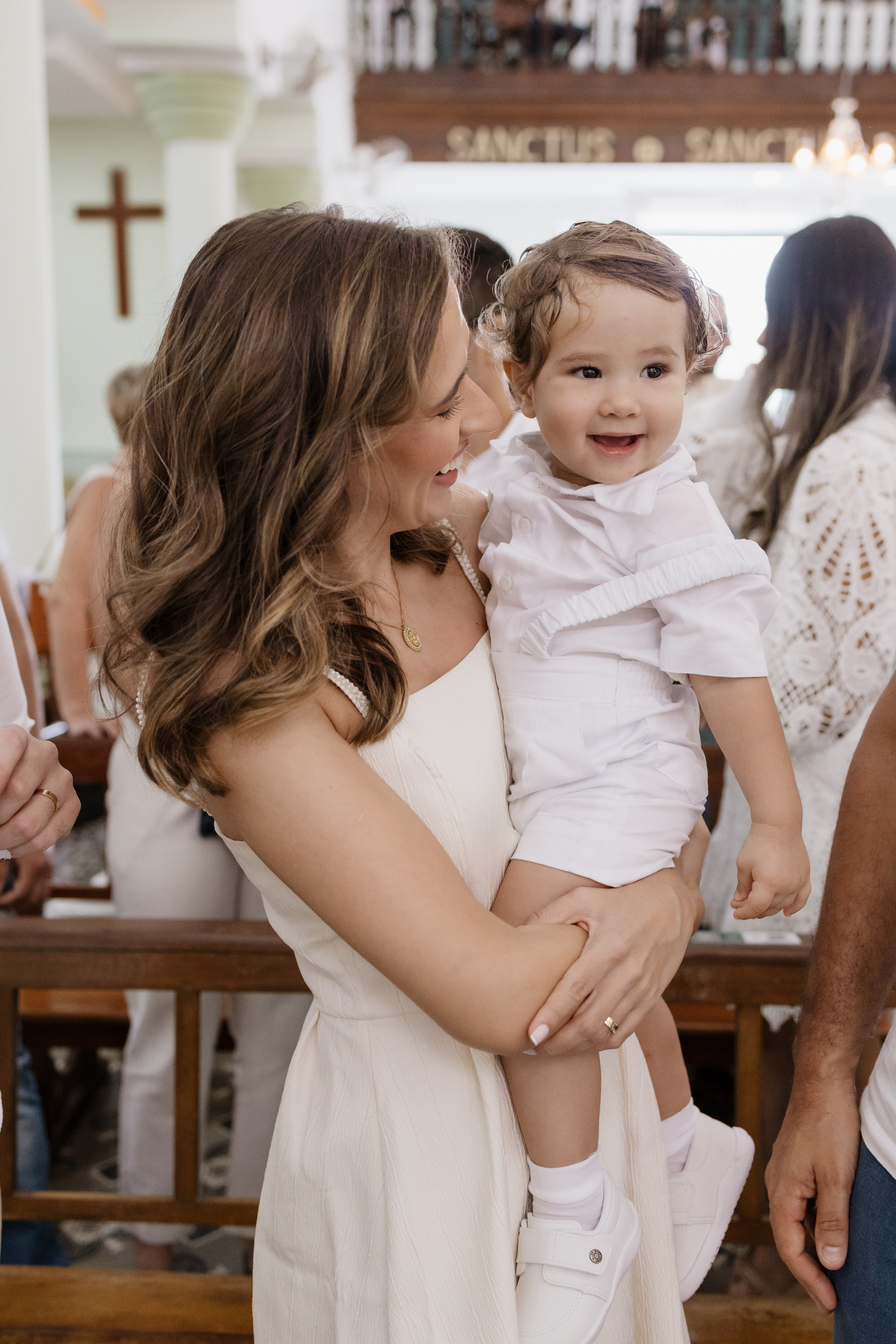 Bebê e madrinha e batizado