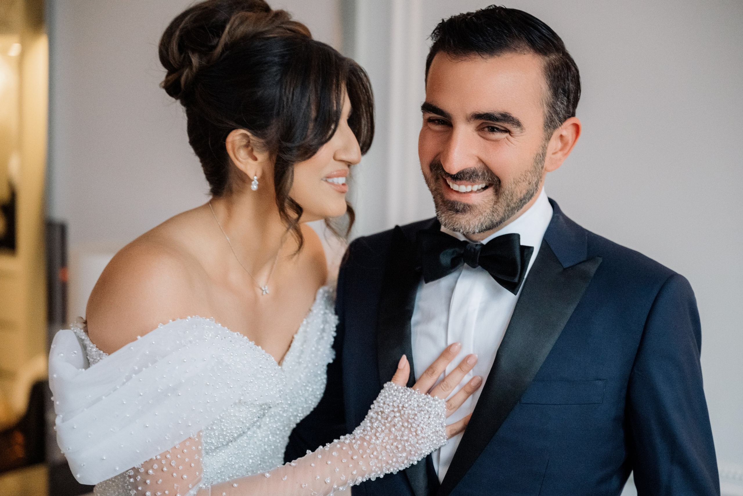 a man and woman in formal attire