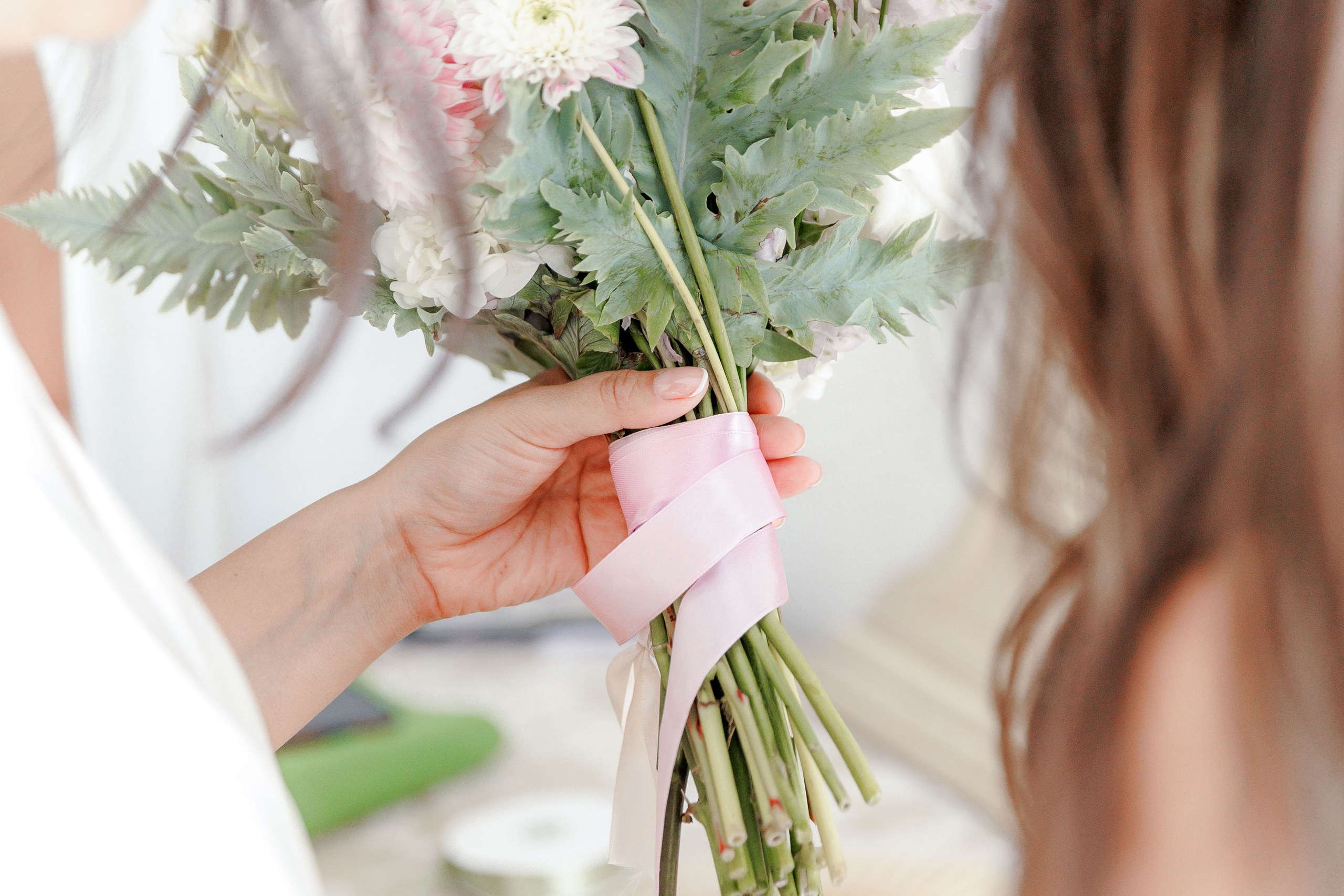 Artistic close-up of a bridal bouquet featuring vibrant flowers for a destination wedding in Barcelona.