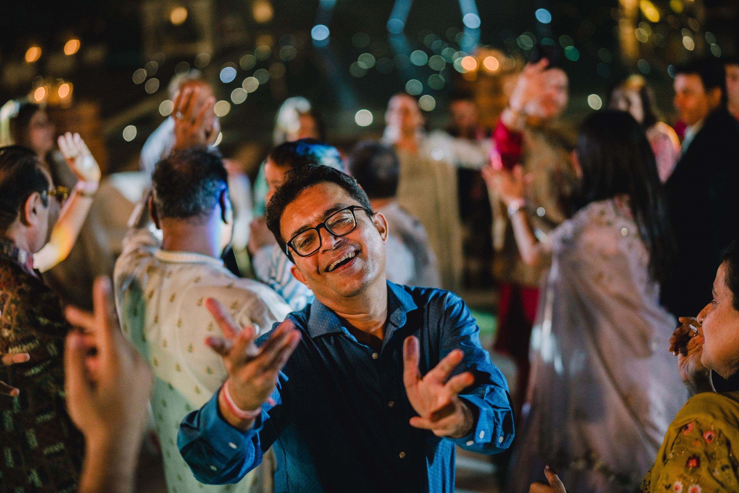 Indian gentleman is singing showing his artistic emotions