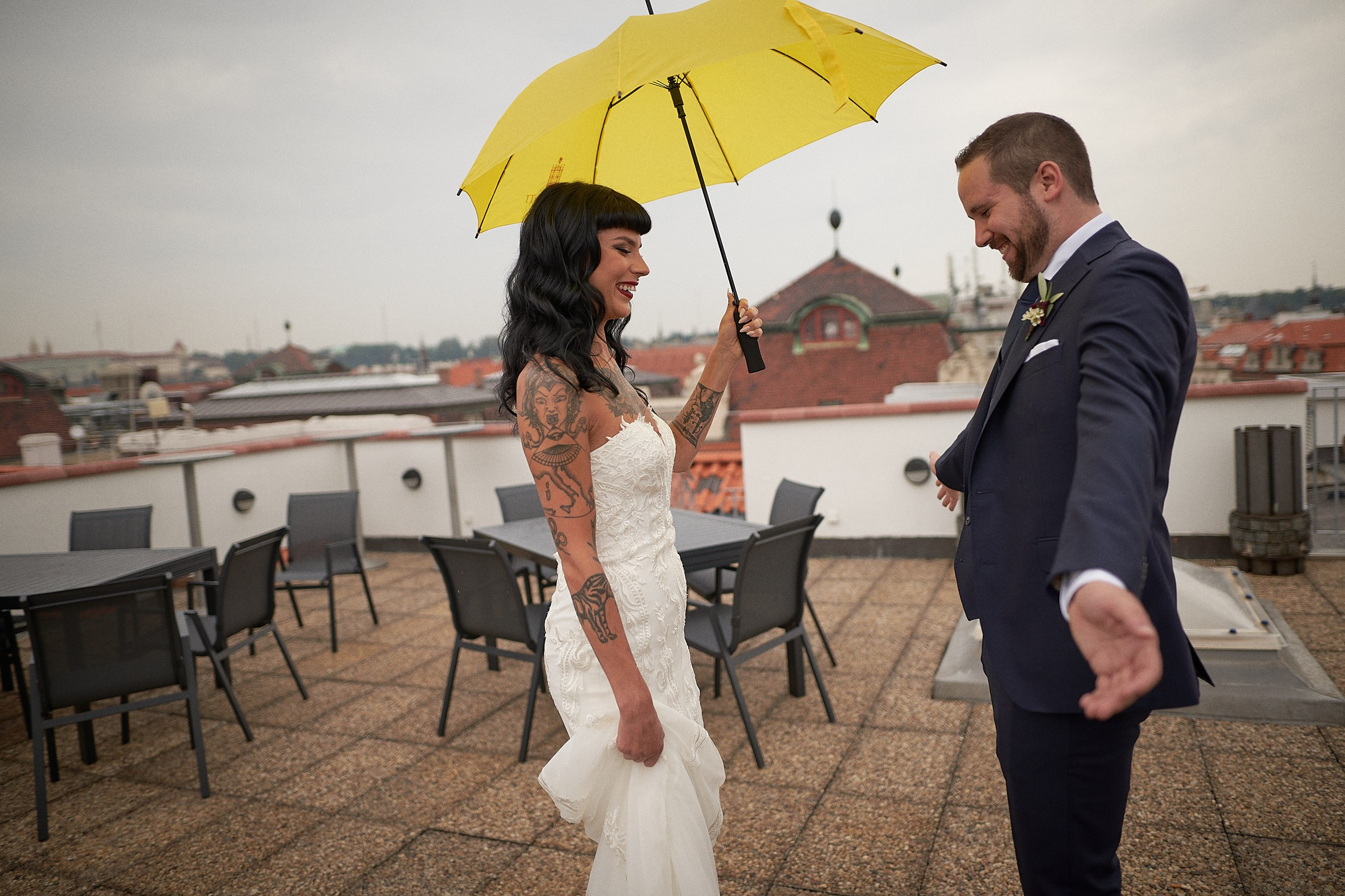 Groom's joyful overwhelmed reaction to bride's wedding dress reveal.