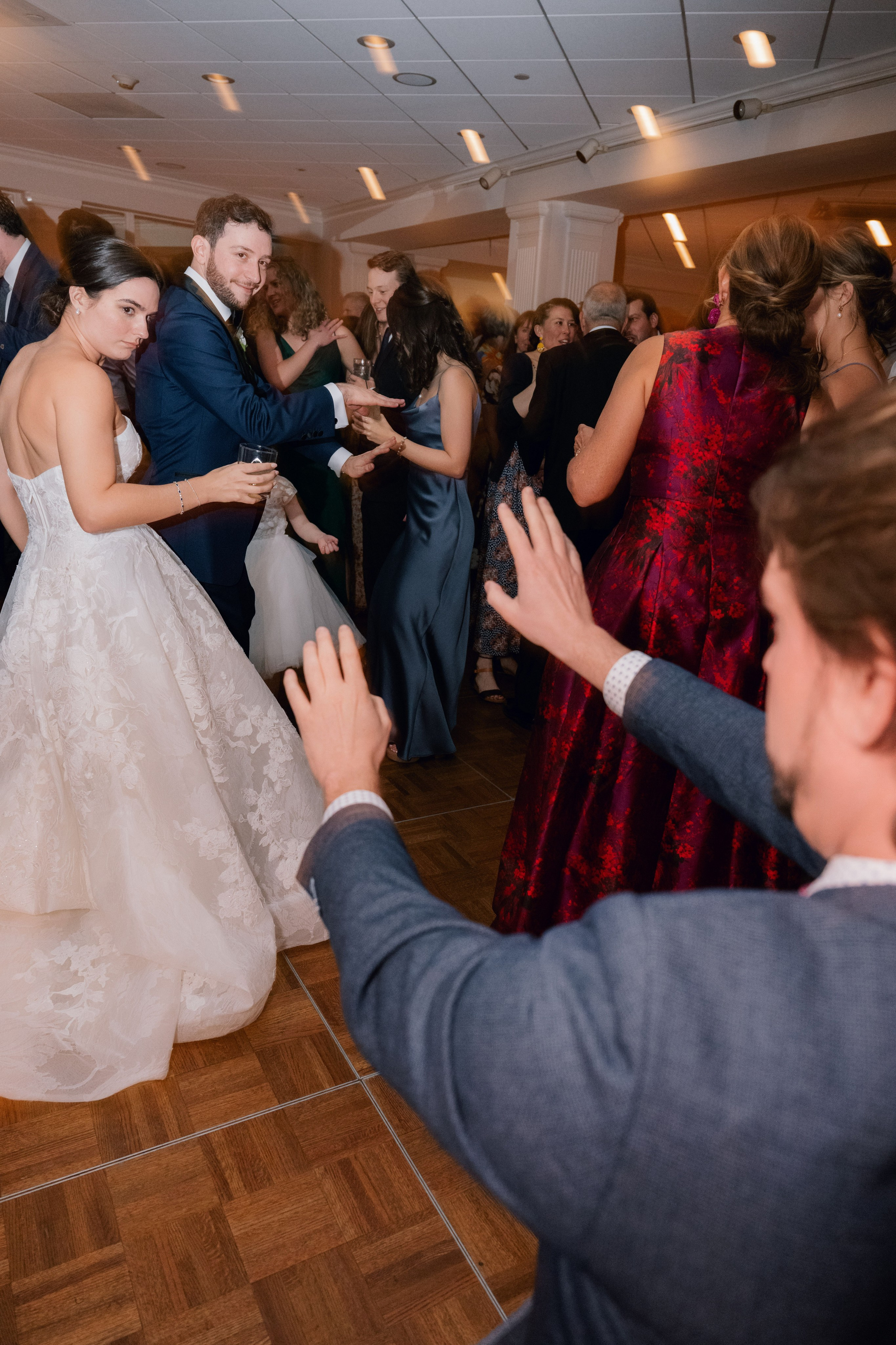 a bride and groom dancing on the dance floor