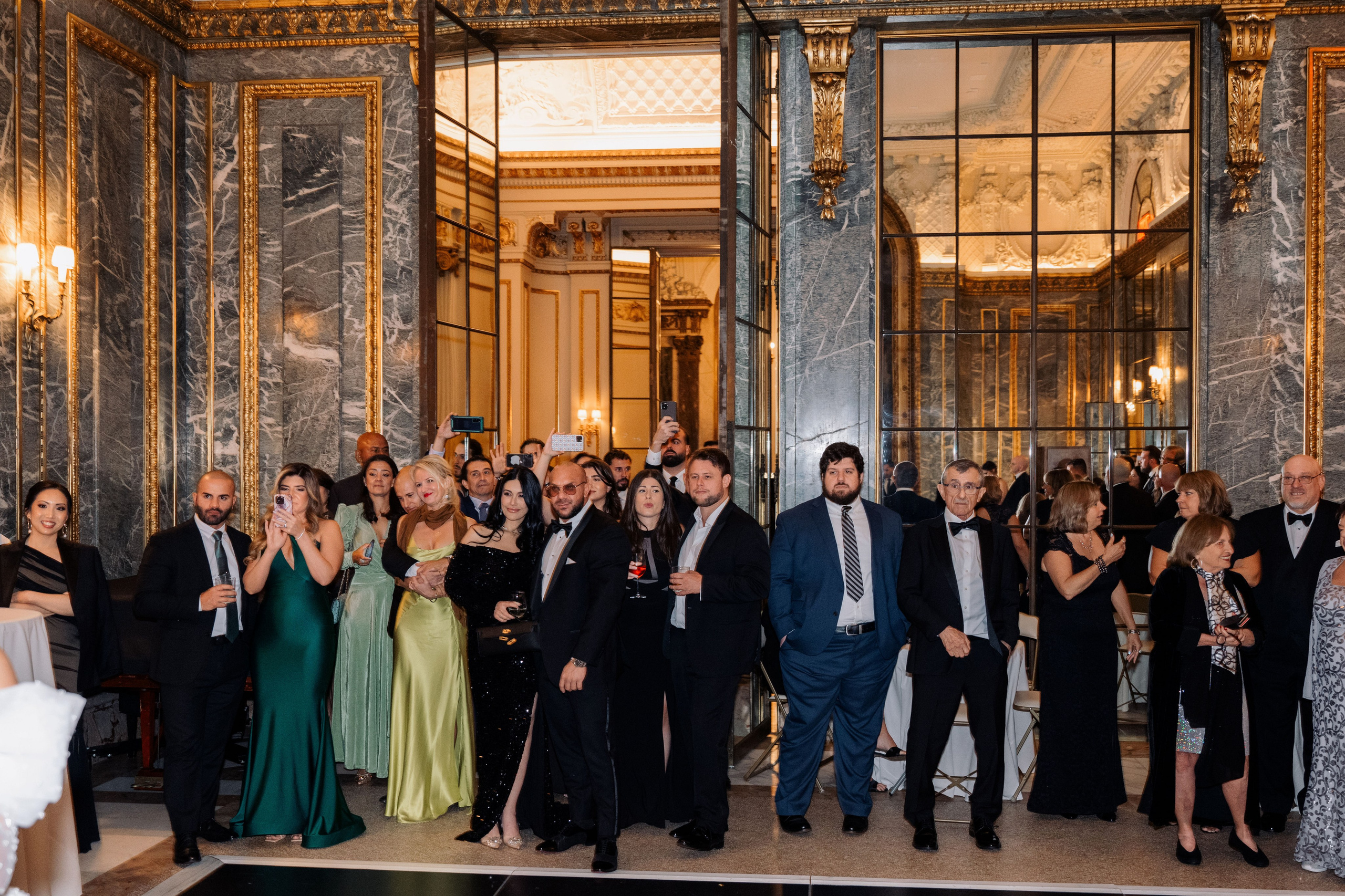 a group of people standing in a room