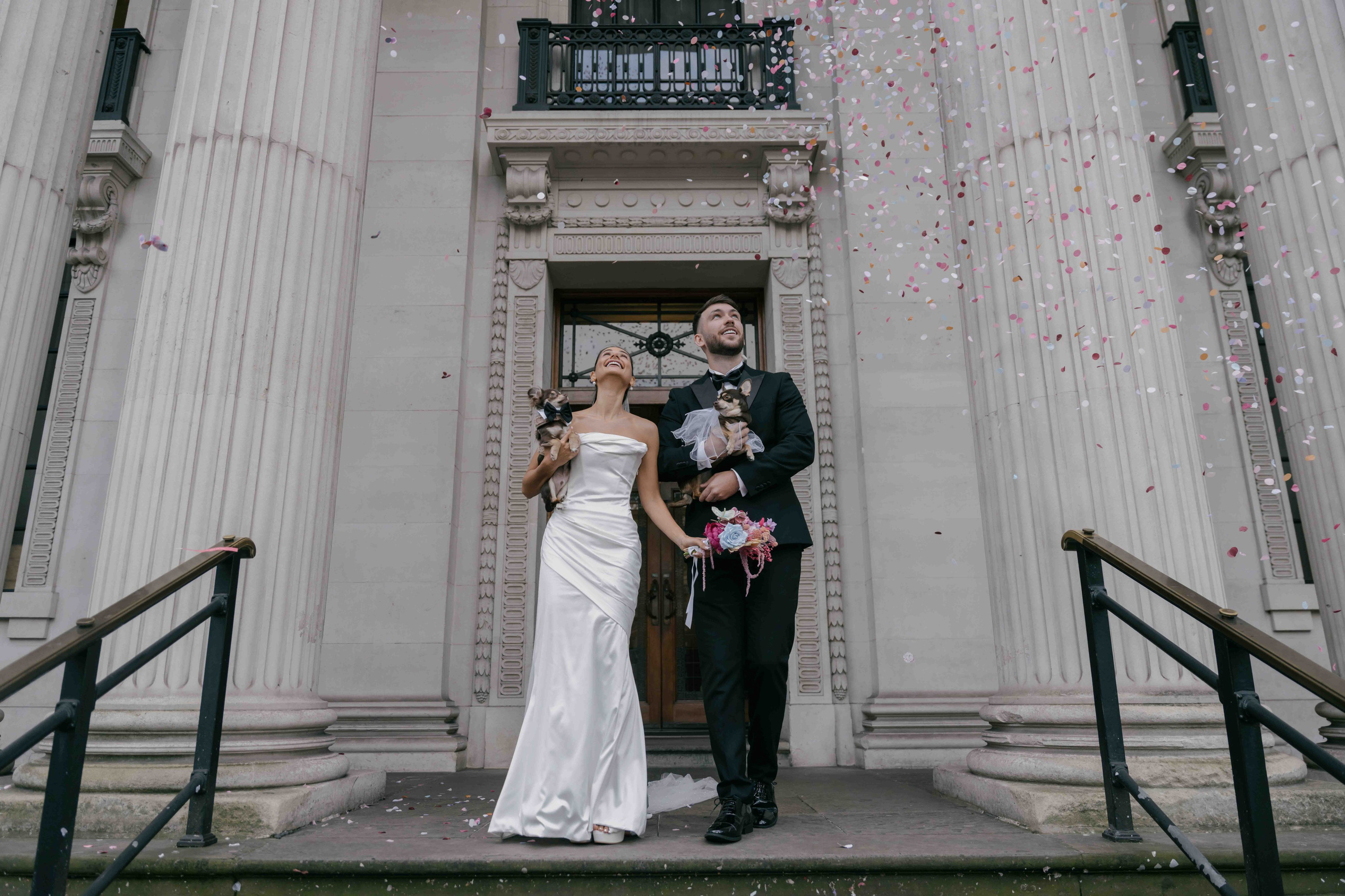 London town hall wedding couple exiting ceremony Marylebone intimate wedding candid emotional moment UK photographer