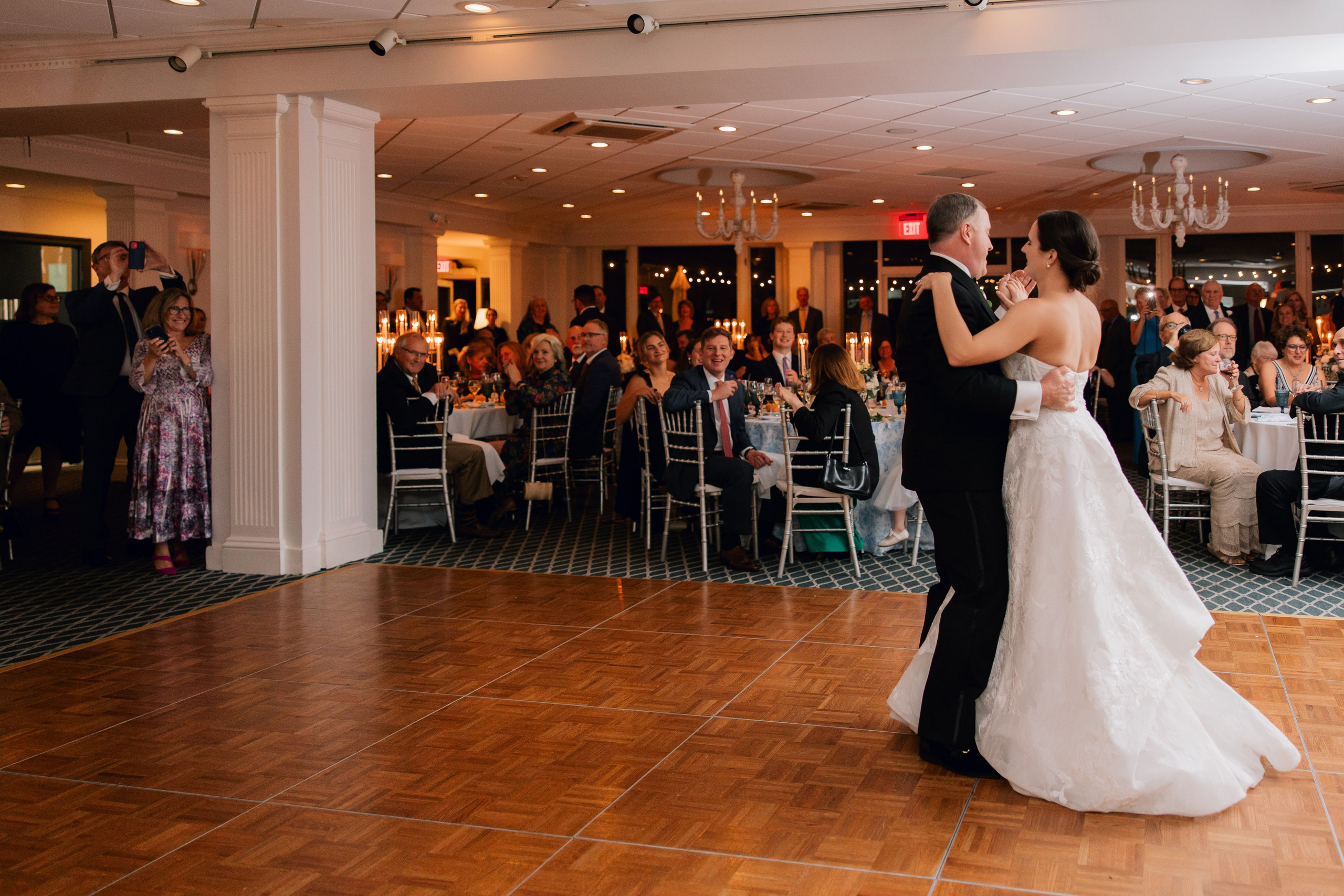 a bride and groom dancing at their wedding reception