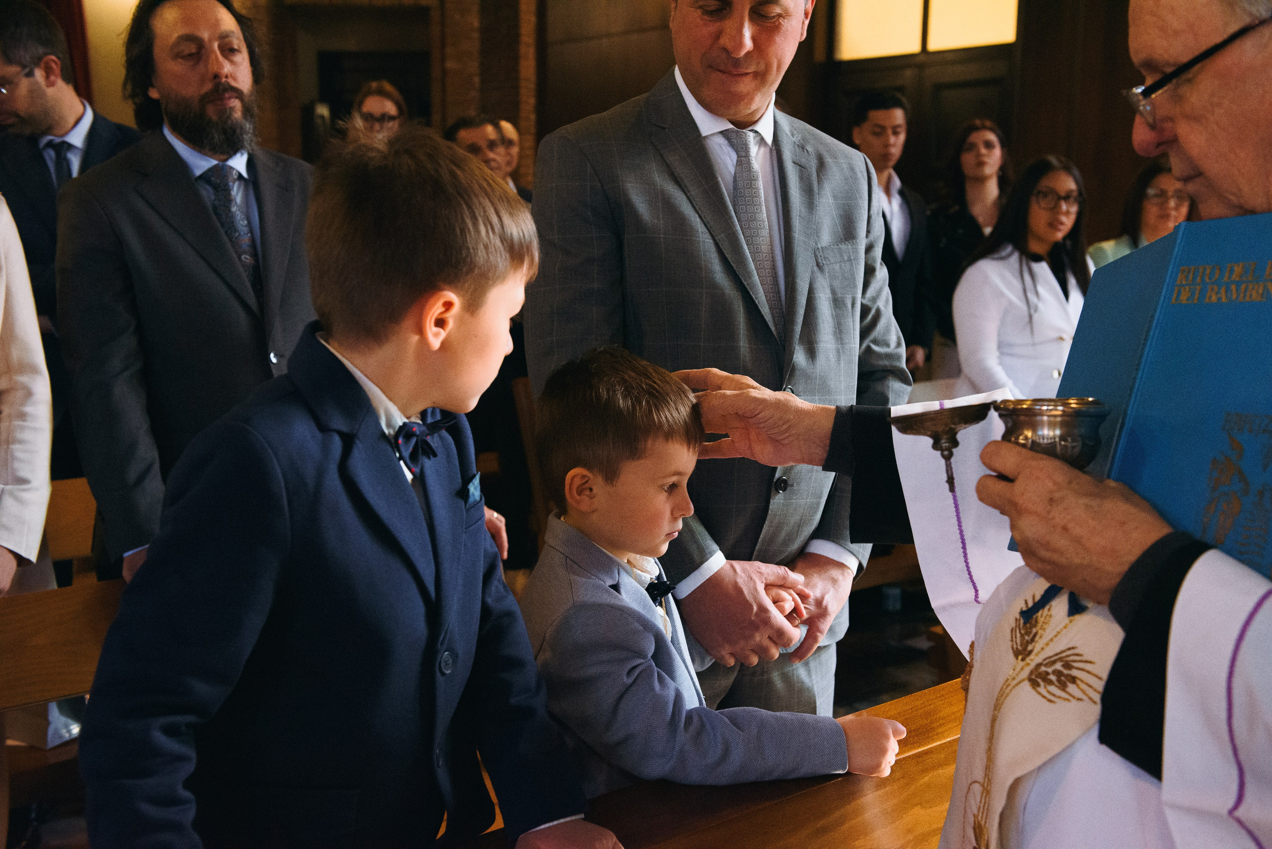 Baptism photography in Milan and nearby areas. Anastasiia Buchinskaia Photographer in Milan