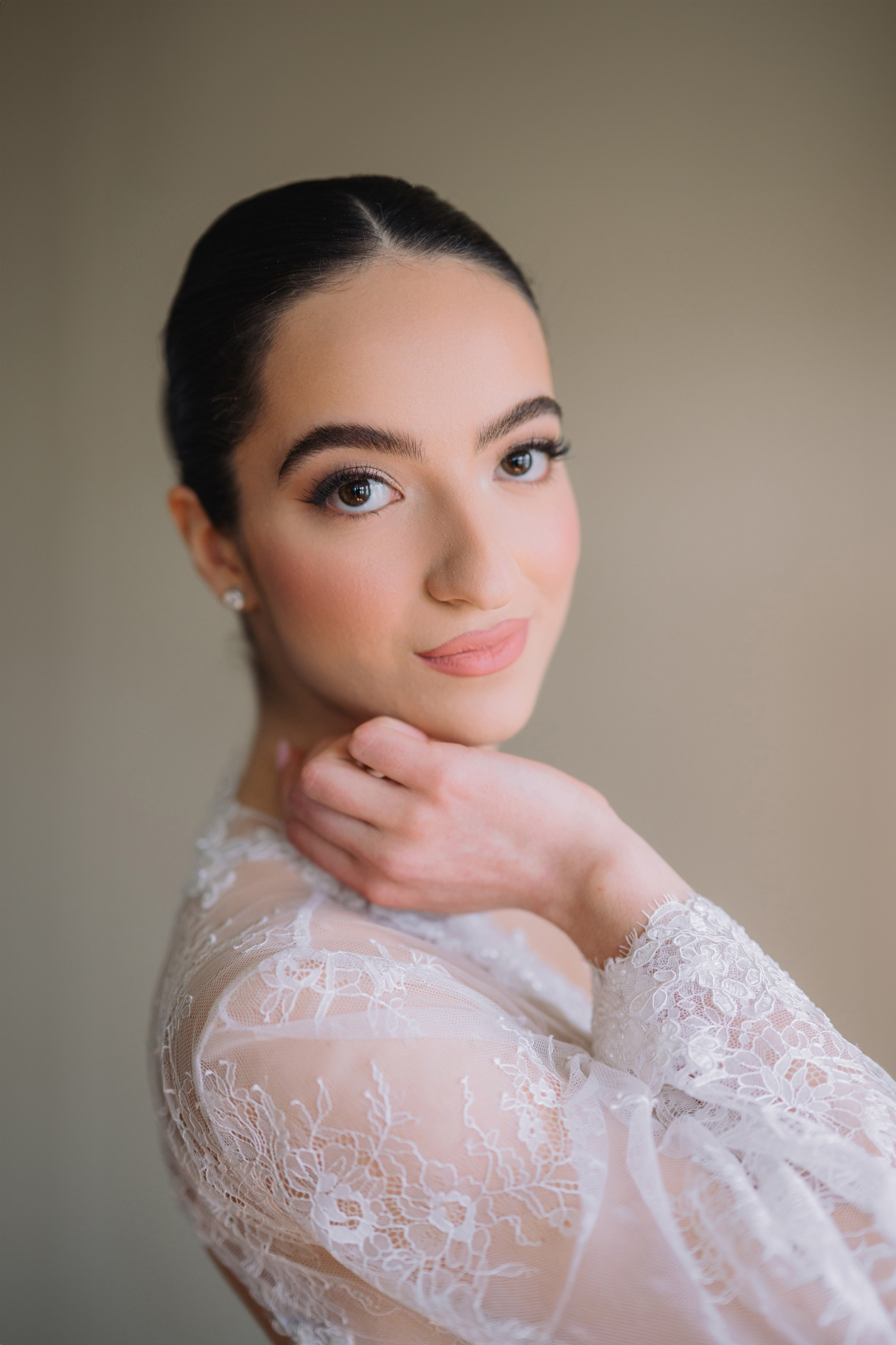 a woman in a white dress with a white lace top