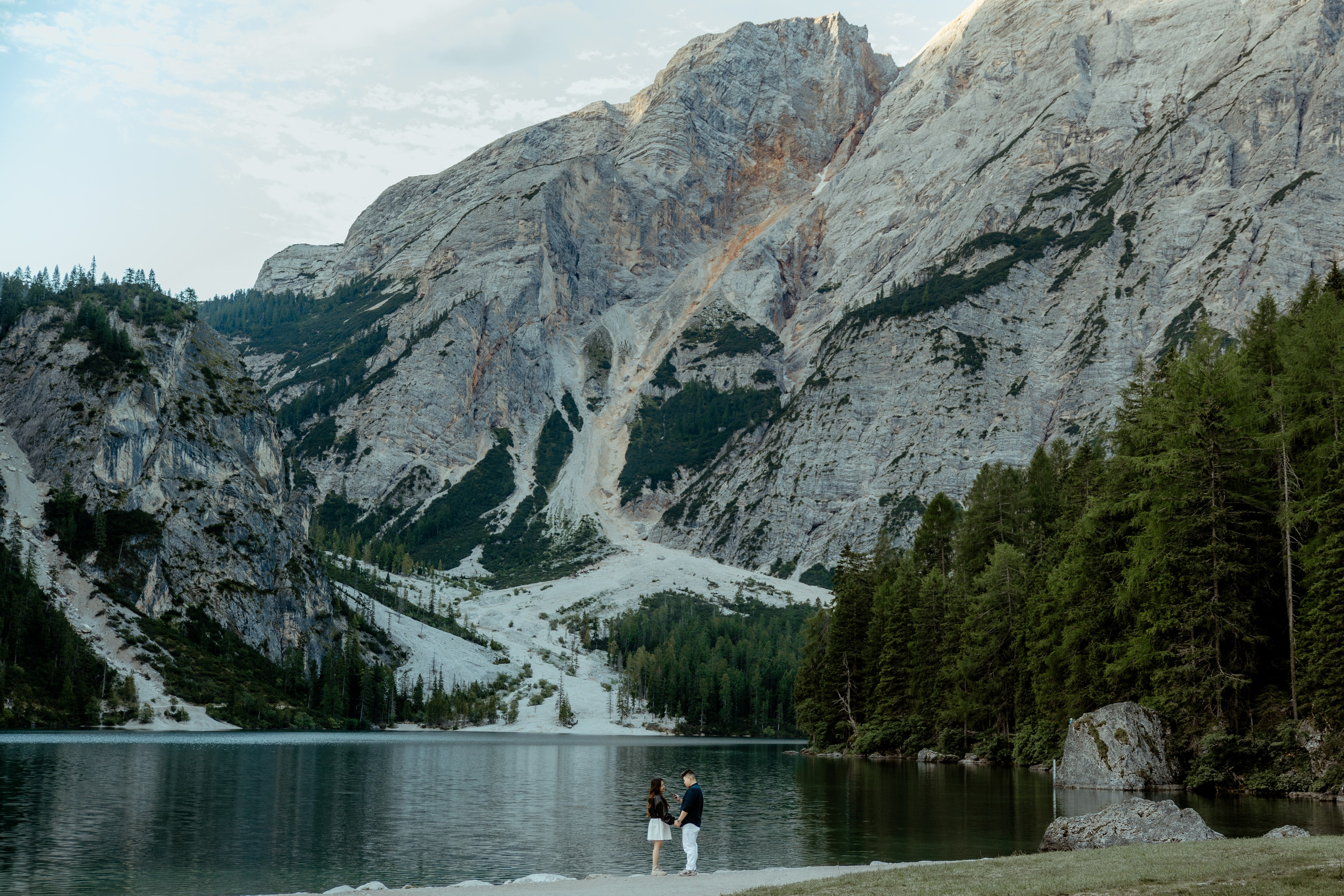 Sunrise proposal at Lago di Braies | Dreamy engagement in the Dolomites. Iceland elopement photographer & videographer