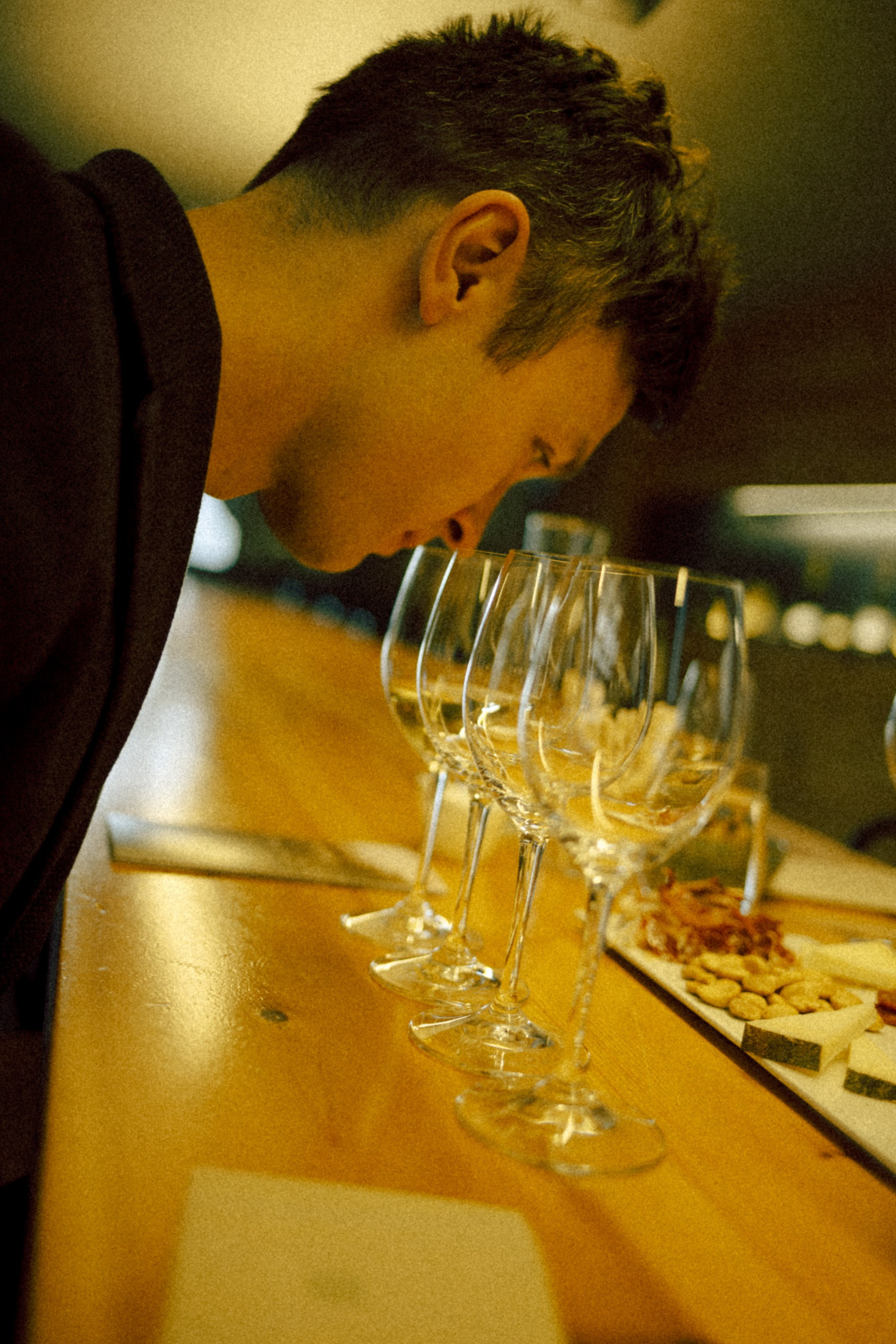 Man enjoying the aroma of different Gramona wines in a tasting session