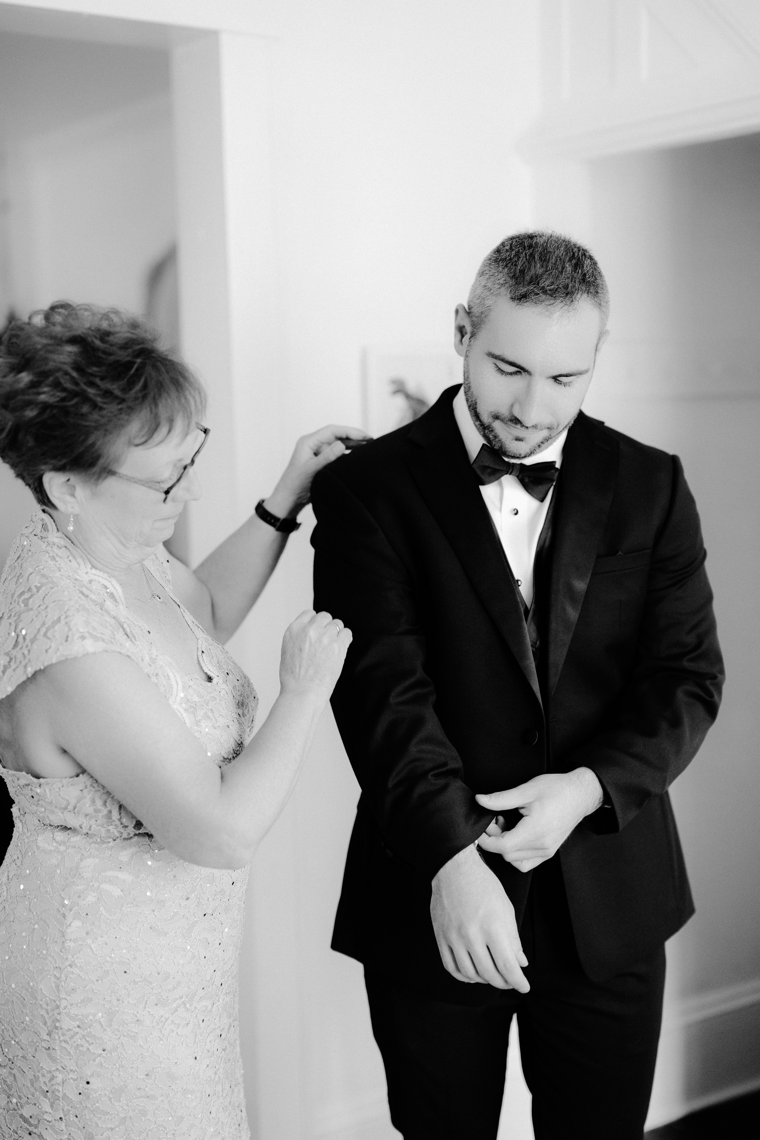 a man and woman in formal attire standing next to each other people
