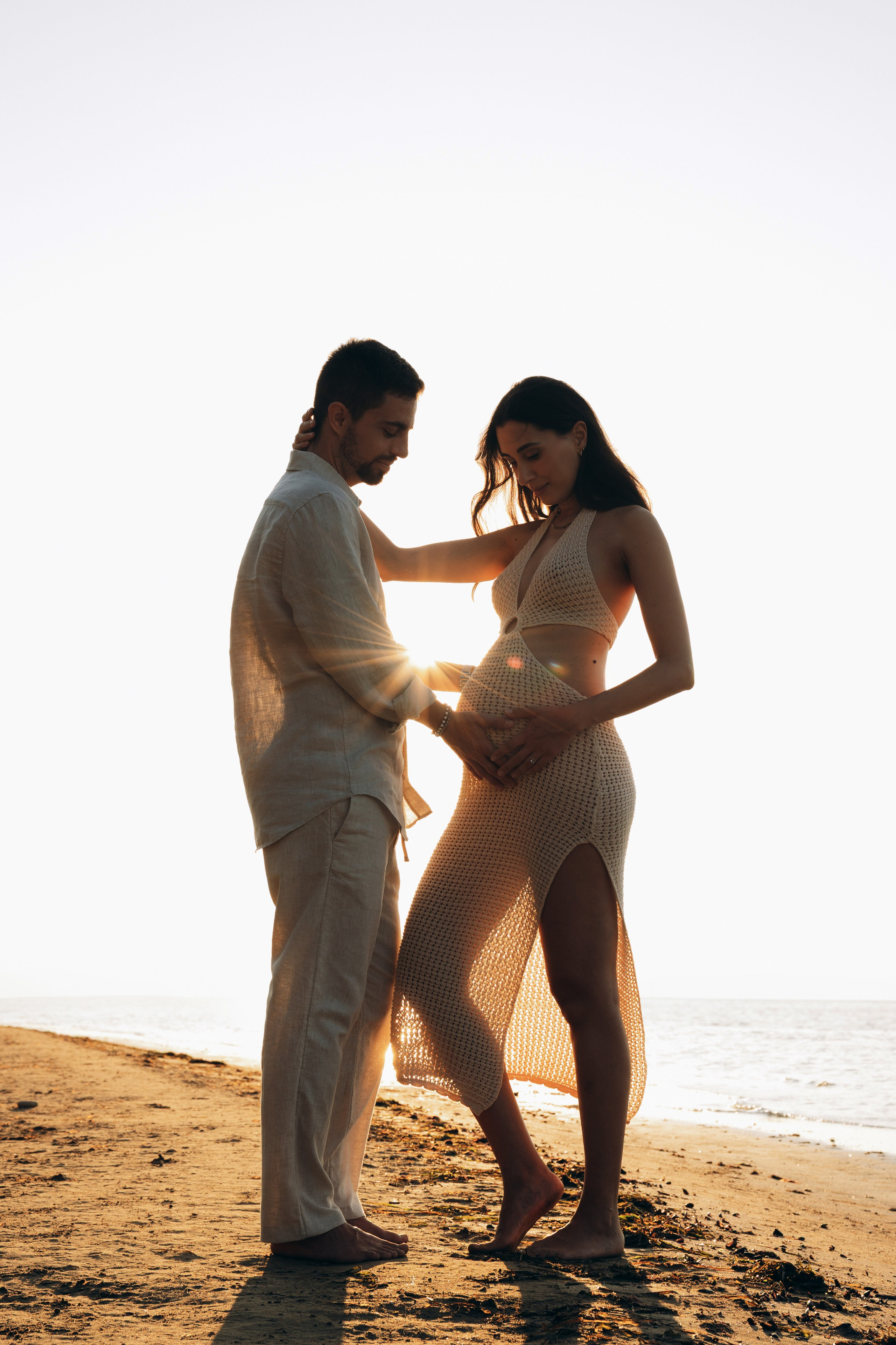 Silhouette gravidanza al mare a Rimini — fotografia artistica maternity