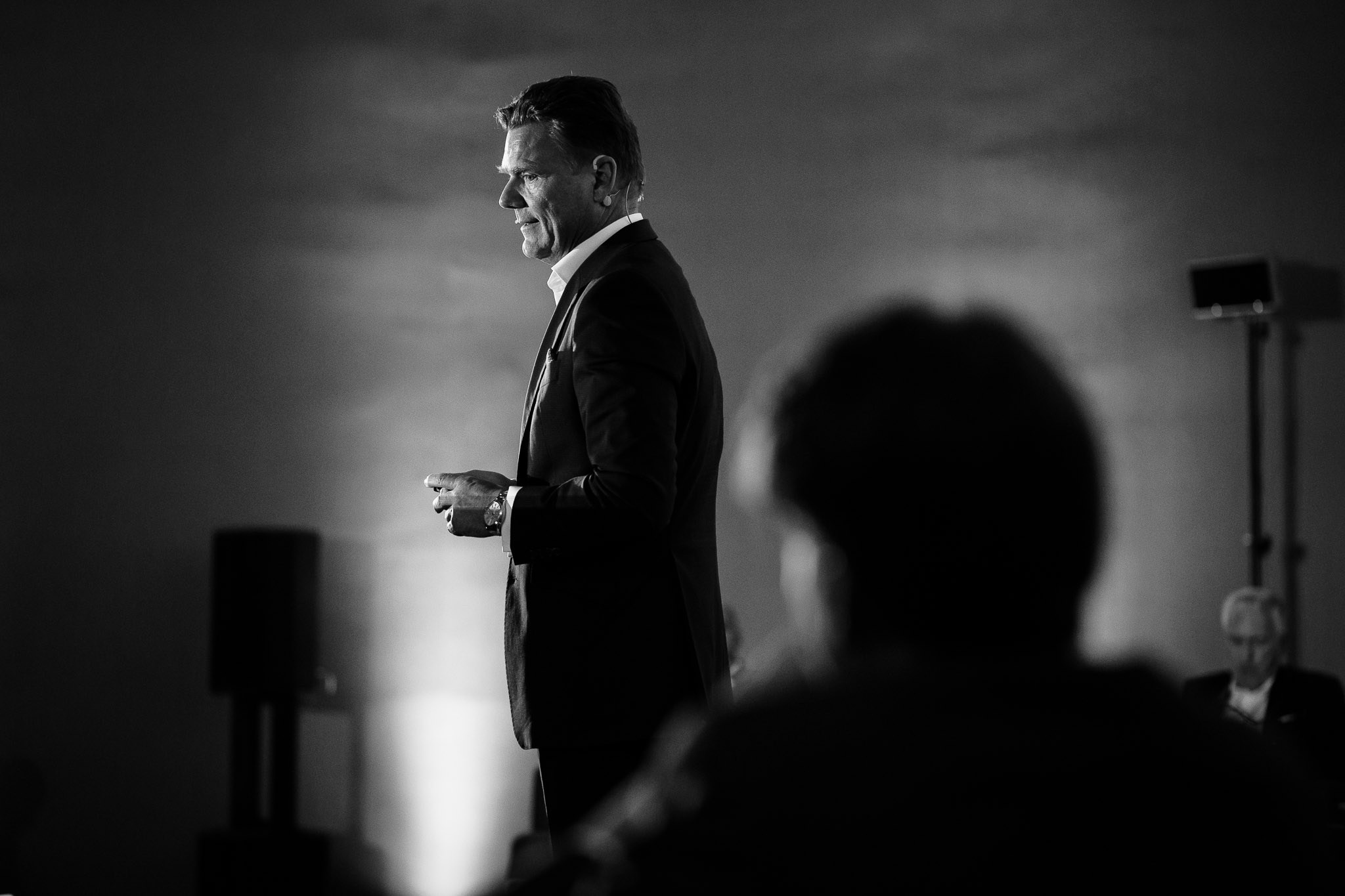 Company Conference in Mallorca in a Black and white picture to enforce the role of the speaker.