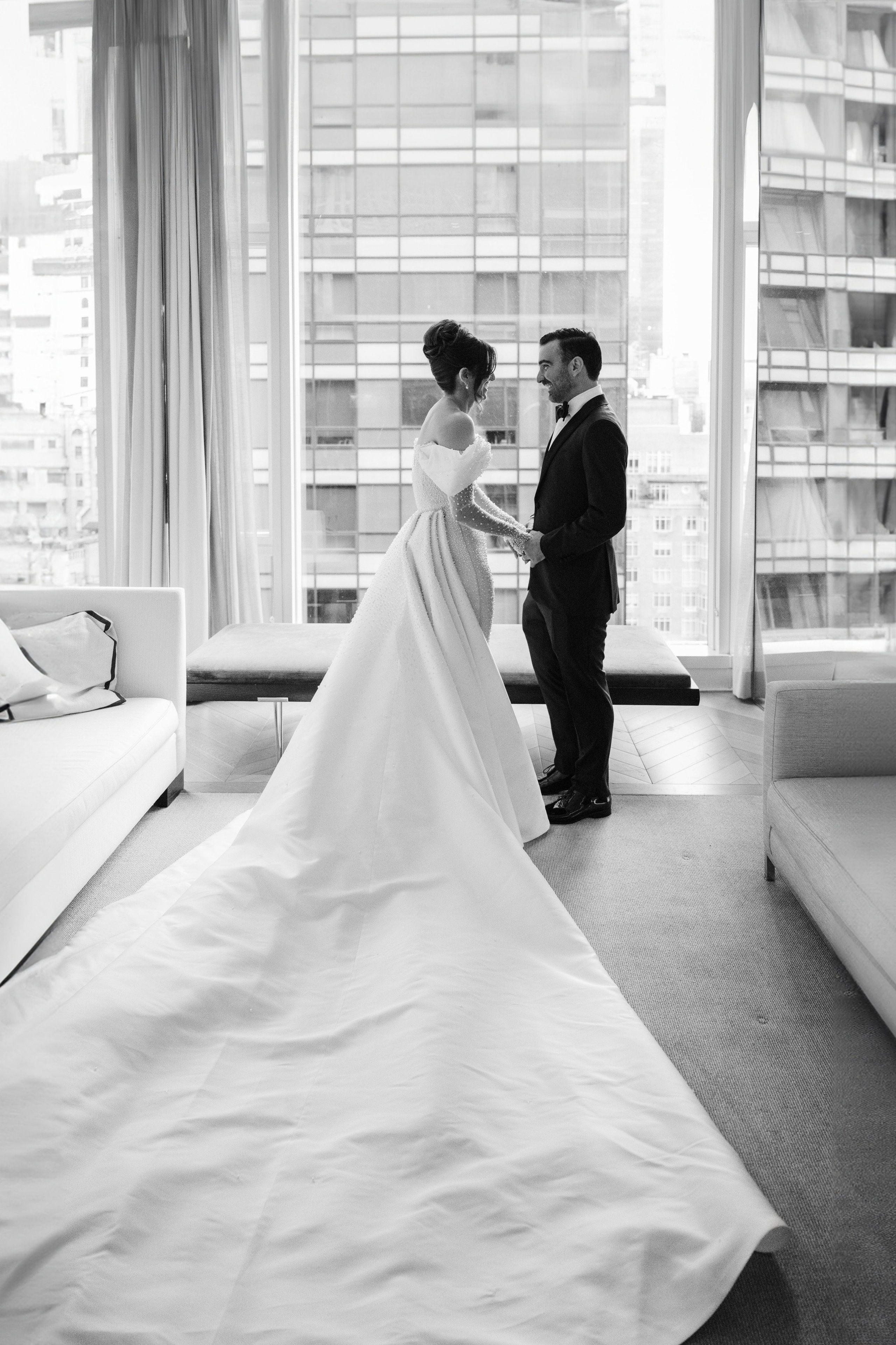 a bride and groom in a hotel room