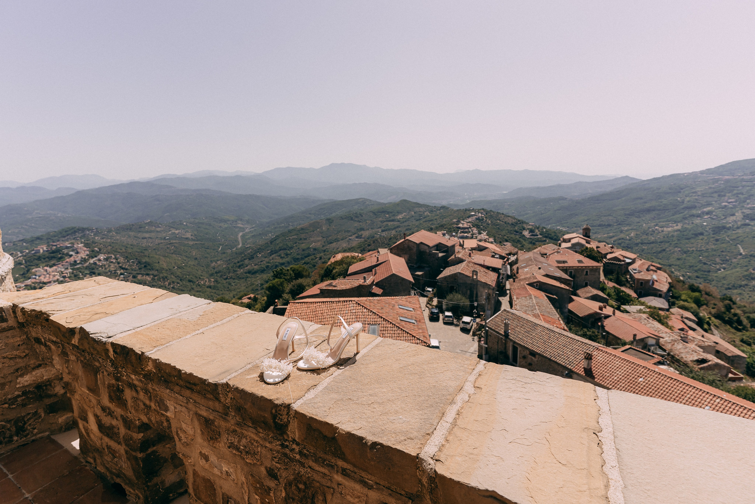 Terracotta rooftops of Rocca Cilento village seen from the castle wall on the wedding morning