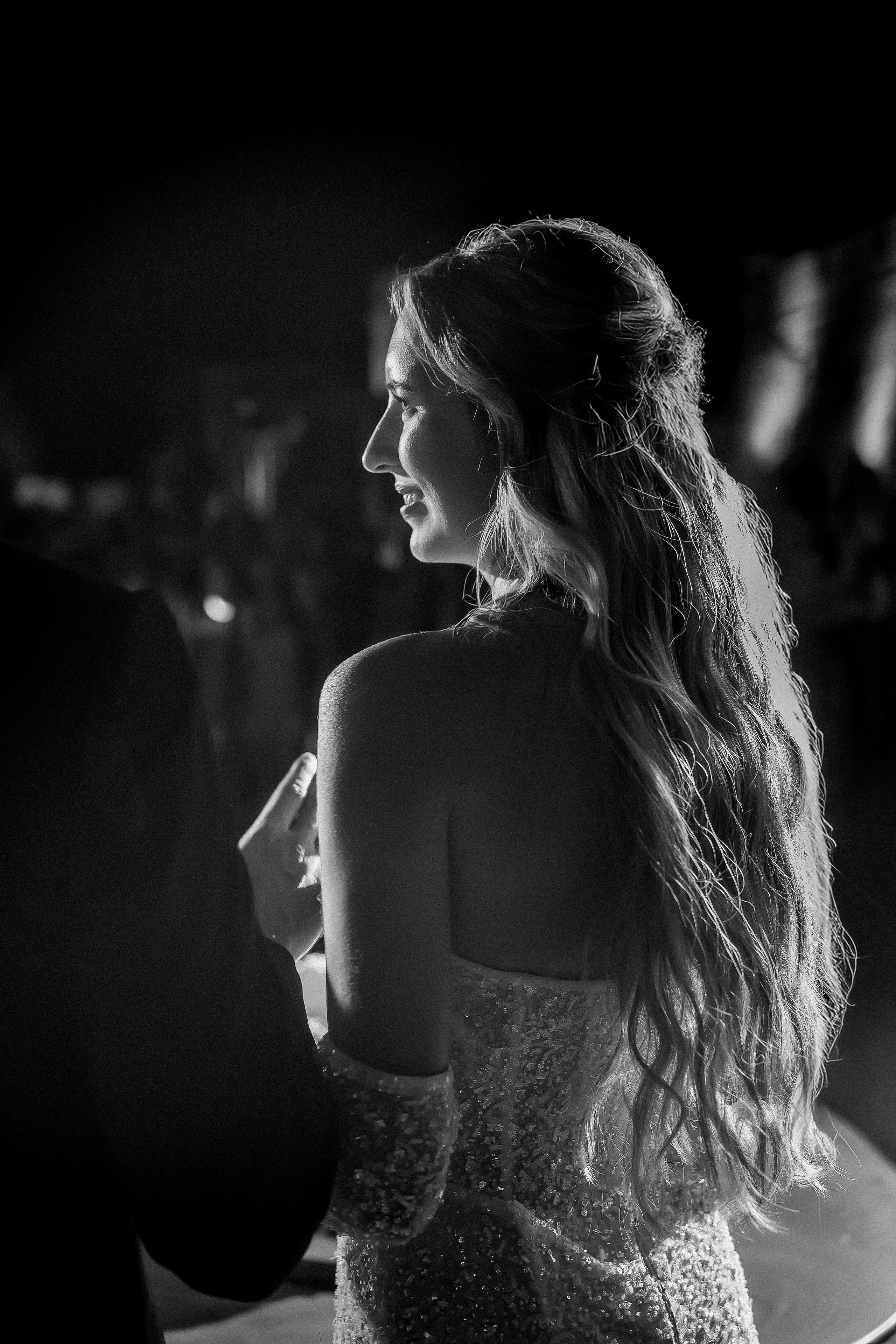 Black and white portrait of the bride during the evening celebration