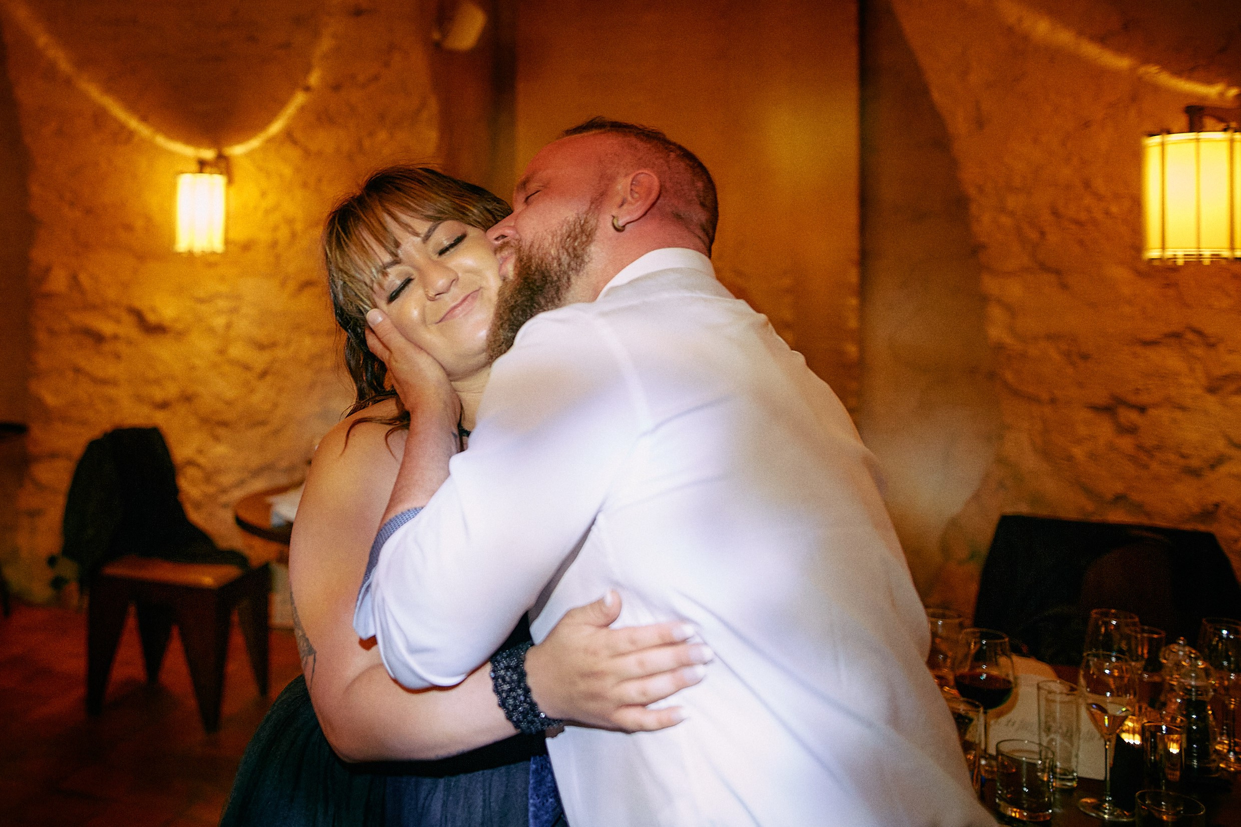 Wedding guests enjoying the party atmosphere.