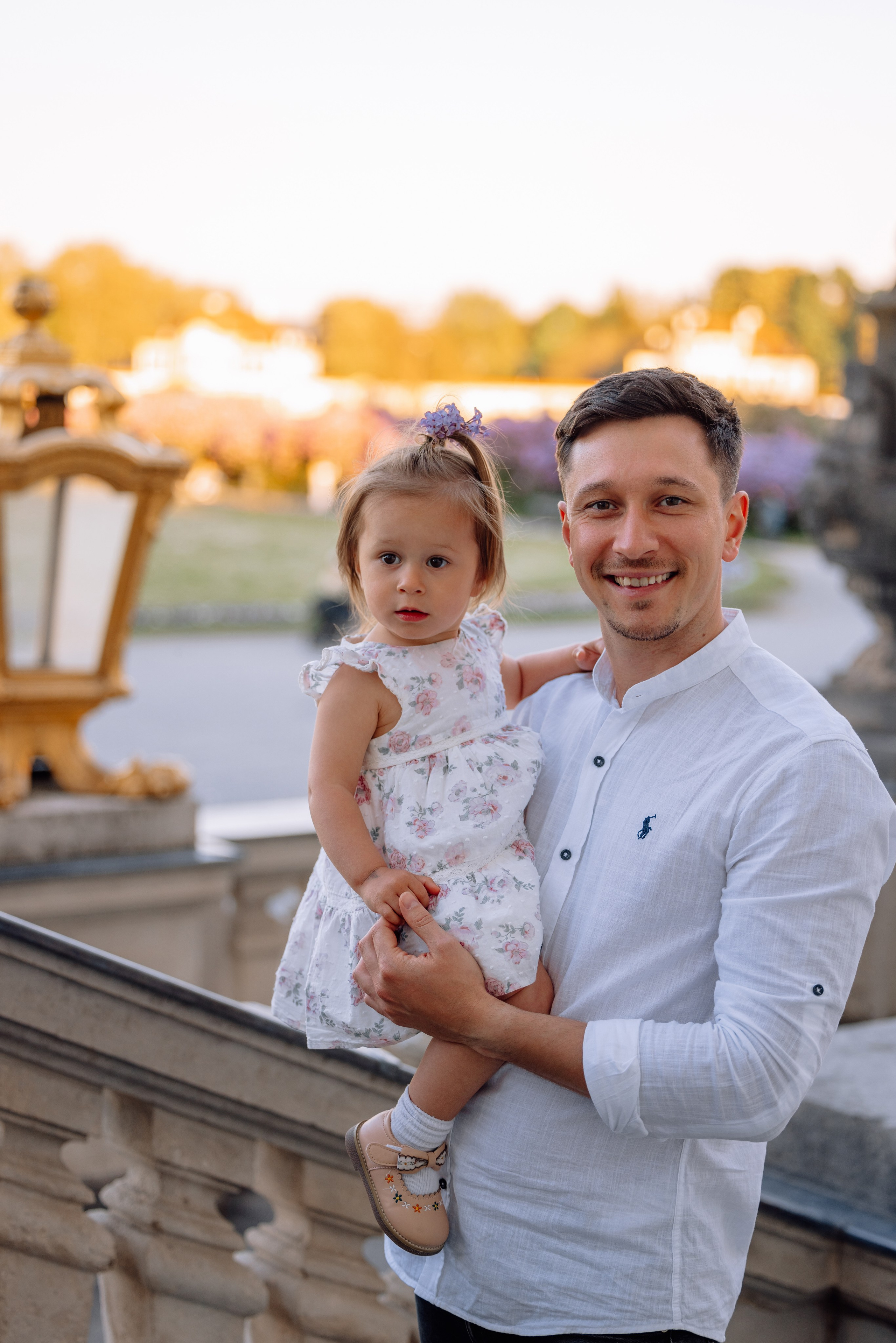 Schloss Nymphenburg: Mama, Papa und ein süßes Mädchen. Hochzeitsfotograf München Taufe Familienfotograf Tanja Mauke