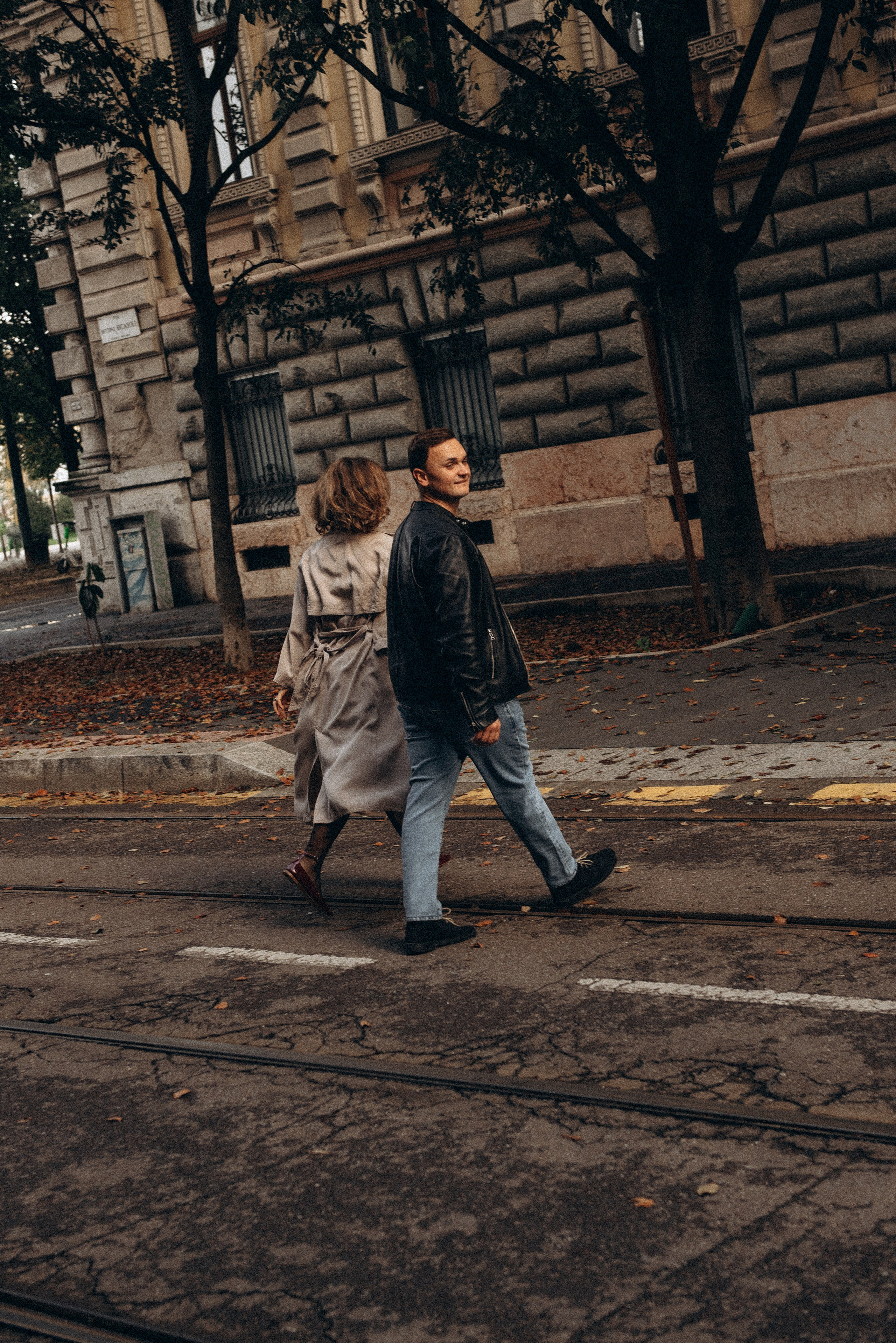 Engagement photography session in Milan with a couple enjoying a romantic walk.