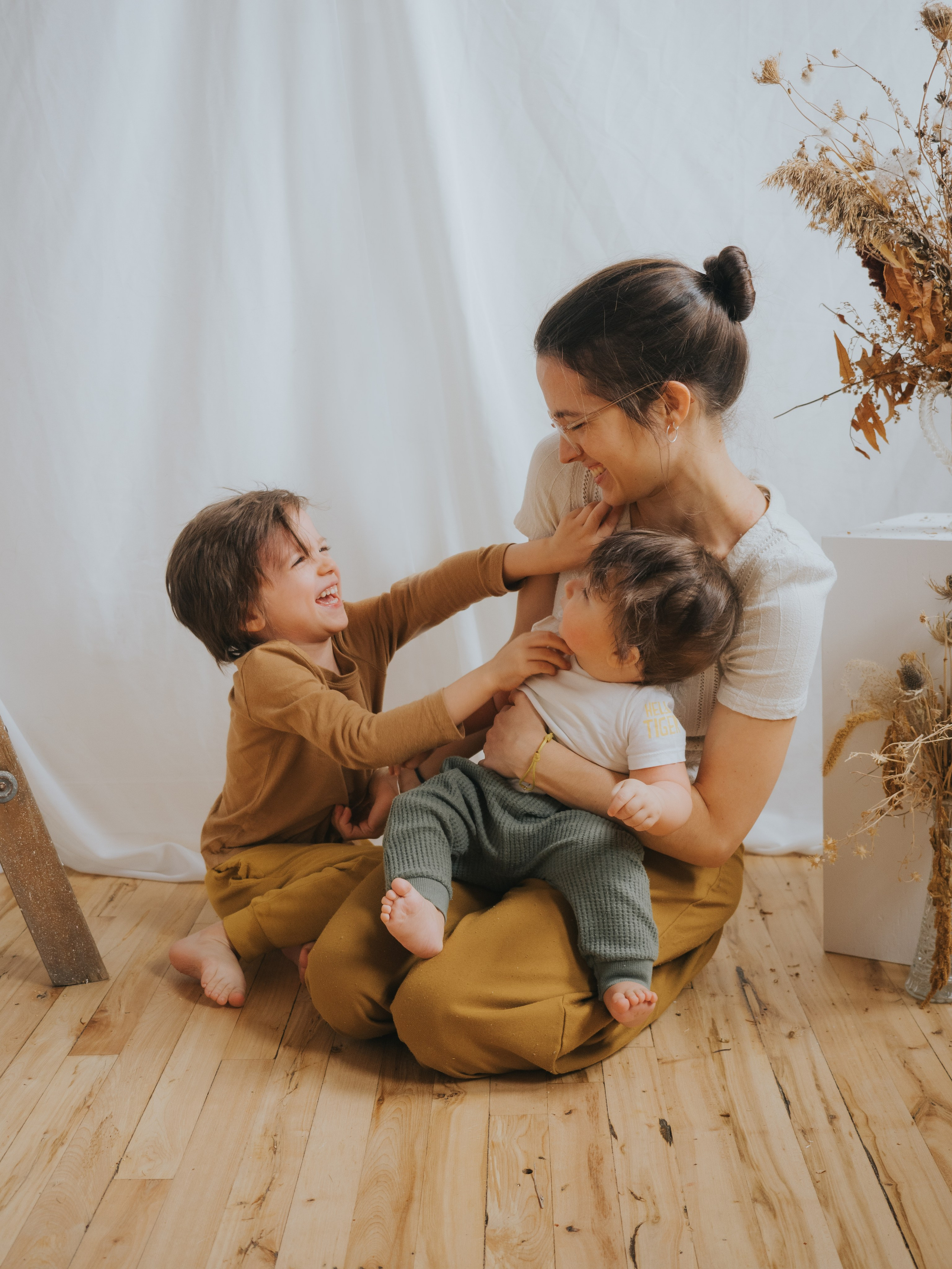 Family tickling each other.