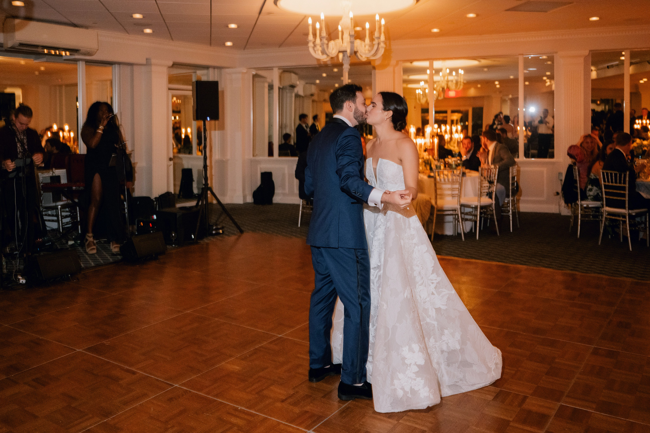 a bride and groom dance together at their wedding reception