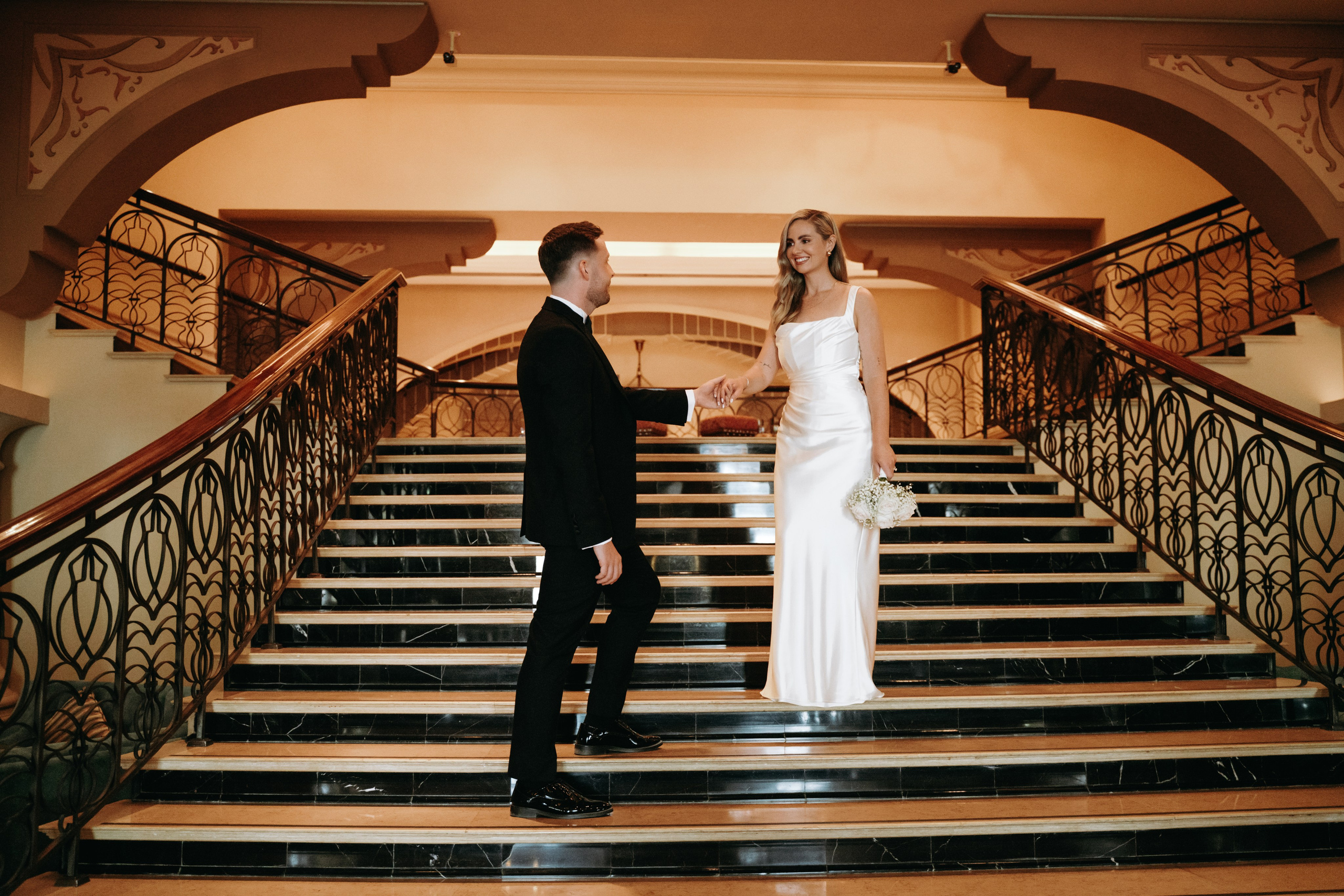 Wedding couple walking together in Abu Dhabi