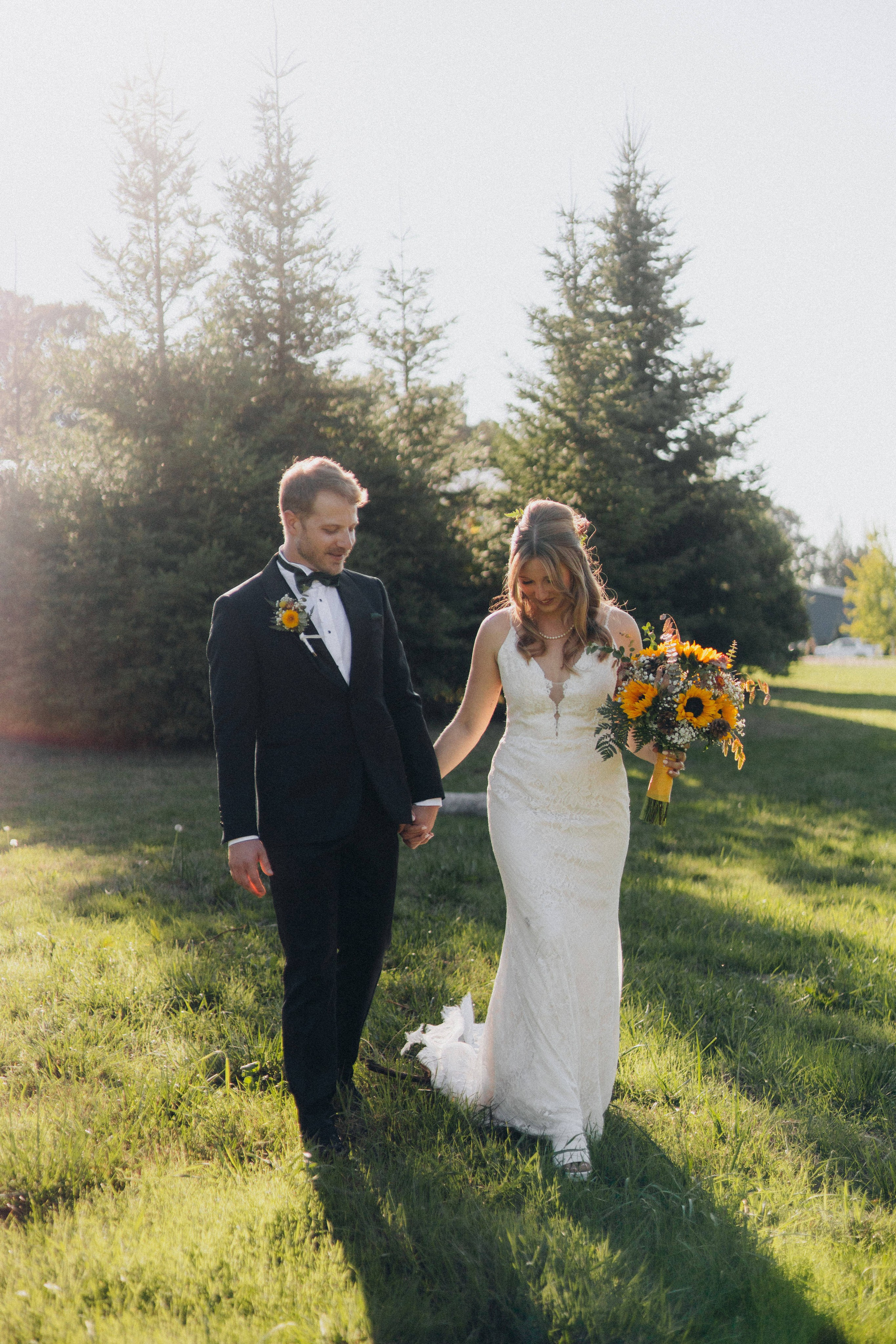 Jessie and Isaac on their wedding day in Portland, Oregon – a genuine moment of joy captured by photographer Georgy Shishkin in a romantic outdoor style, reflecting the charm of Portland & Seattle wedding photography.
