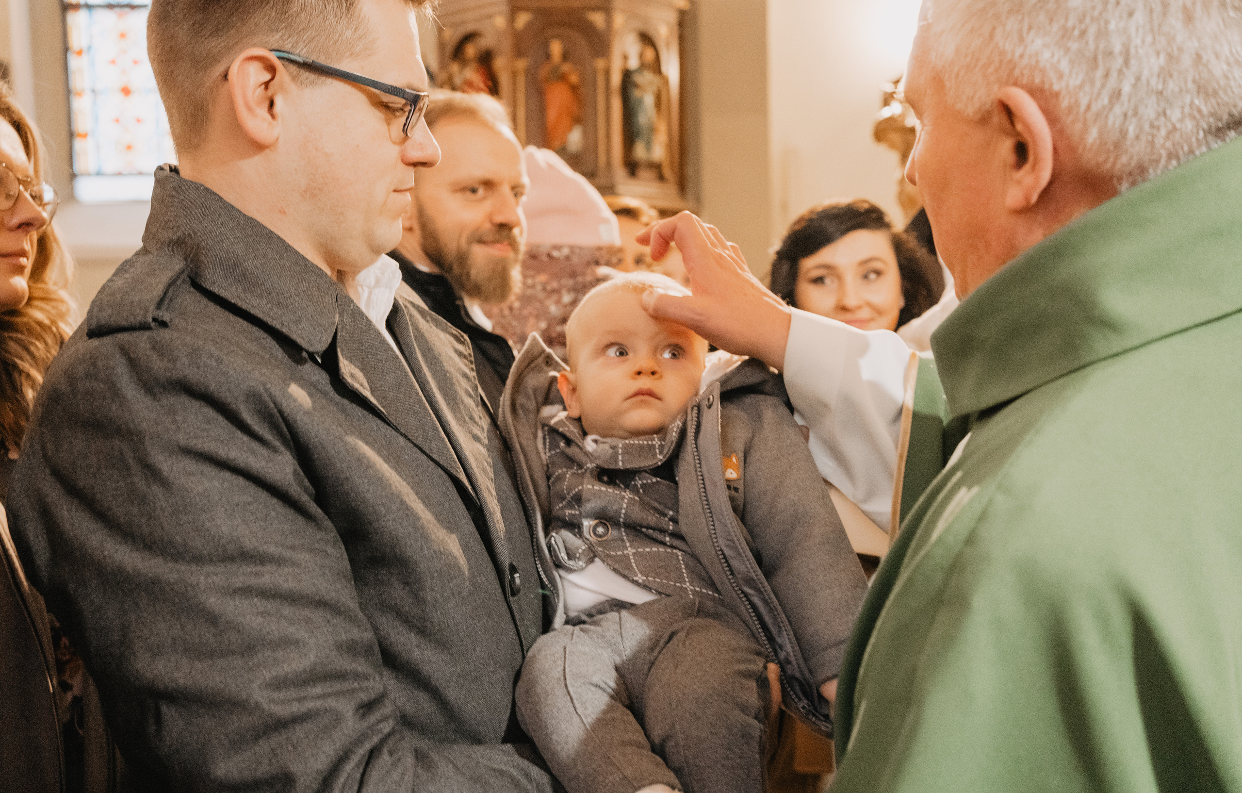 Reportaż z okazji chrztu świętego w Łodzi.