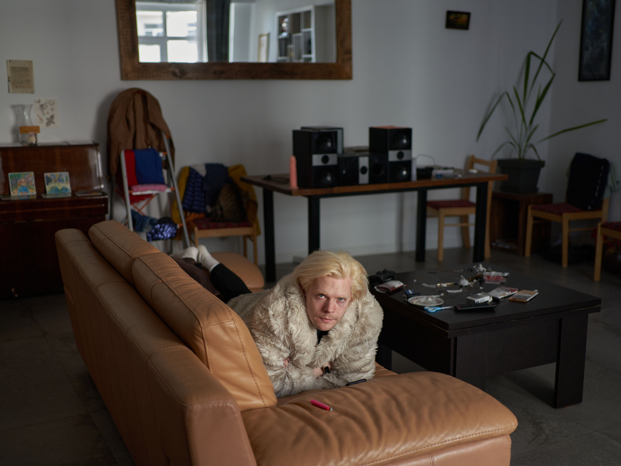 Legions is a composer, interdisciplinary artist, openly queer, non-binary trans person. He has written poetry and music for an anti-war punk album.