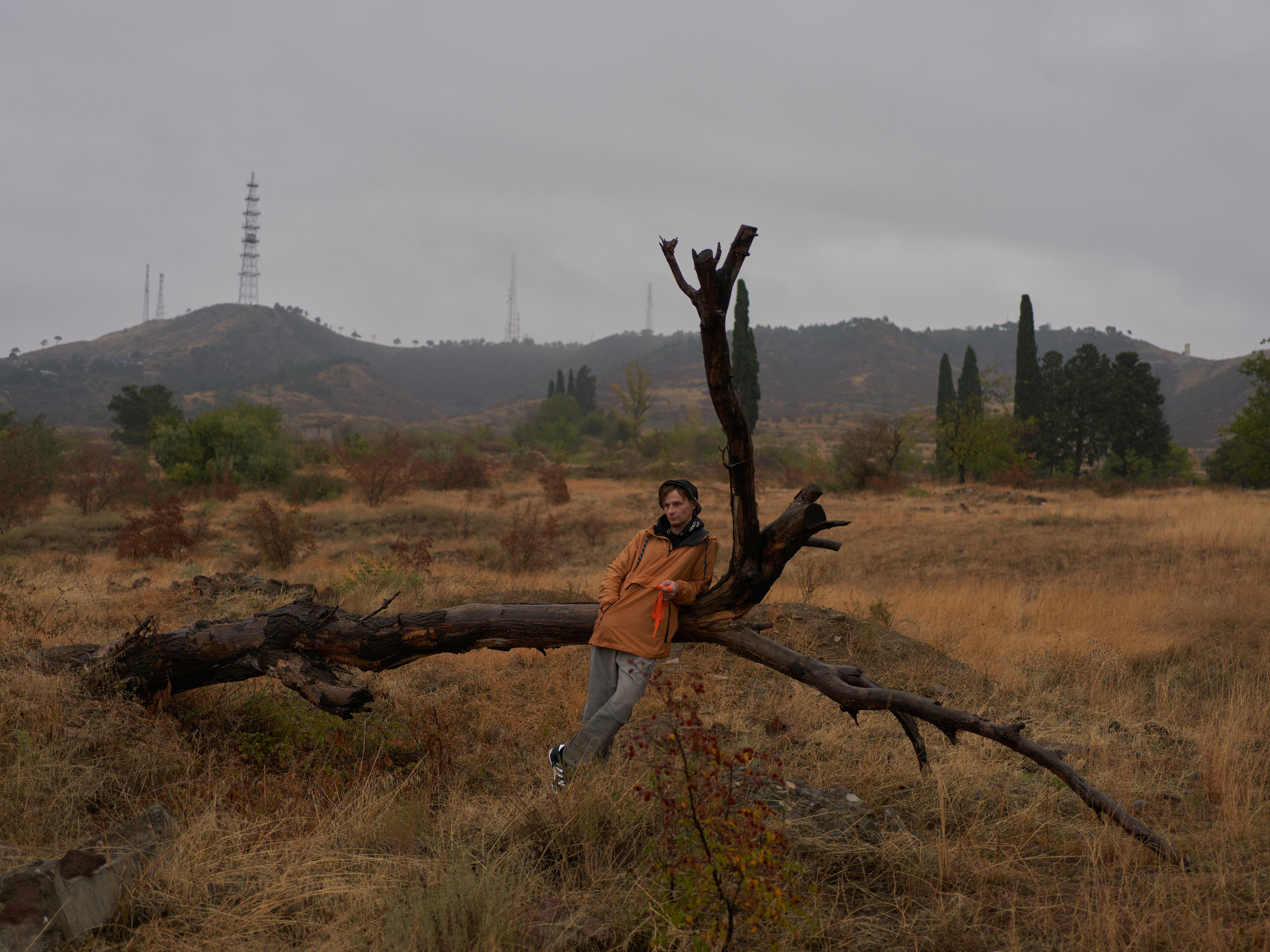 Alex, artist and author of children's tales. He gave up building his own house in the village because of the threat of being drafted into the war.