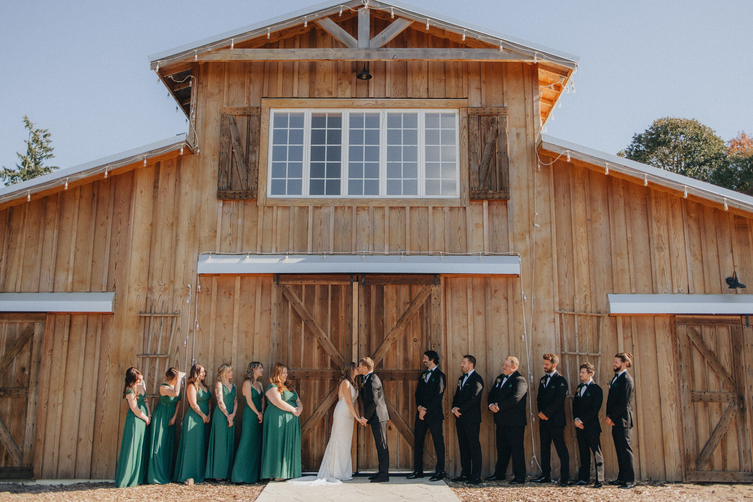 Jessie and Isaac on their wedding day in Portland, Oregon – a genuine moment of joy captured by photographer Georgy Shishkin in a romantic outdoor style, reflecting the charm of Portland & Seattle wedding photography.