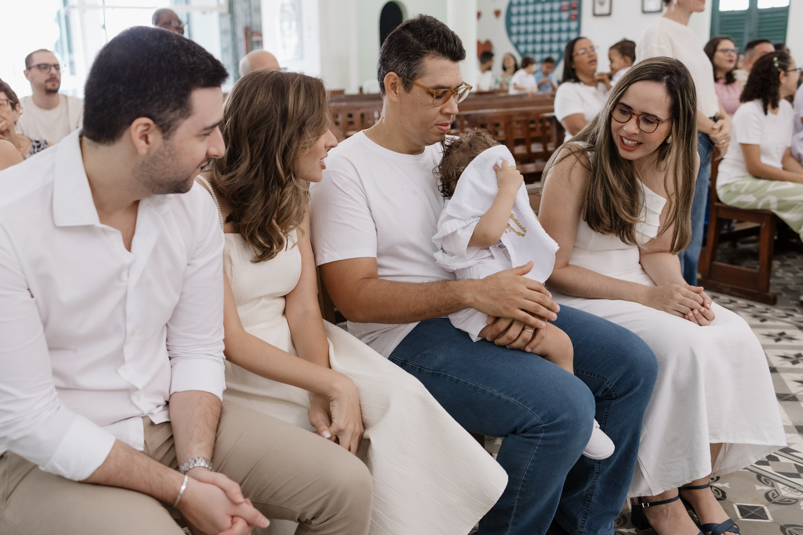 Registro espontâneo da família antes do batizado na Igreja da Torre