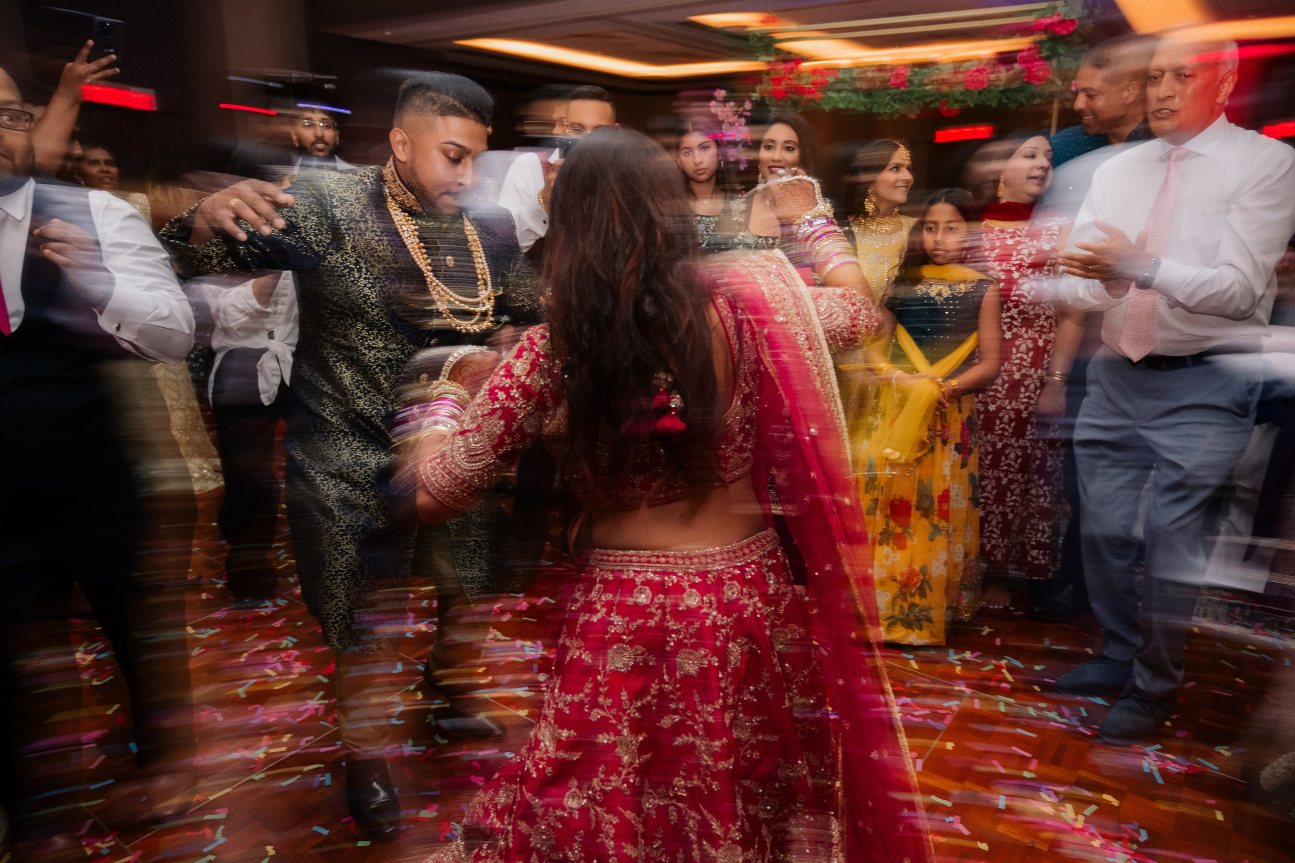 a group of people dancing in a room