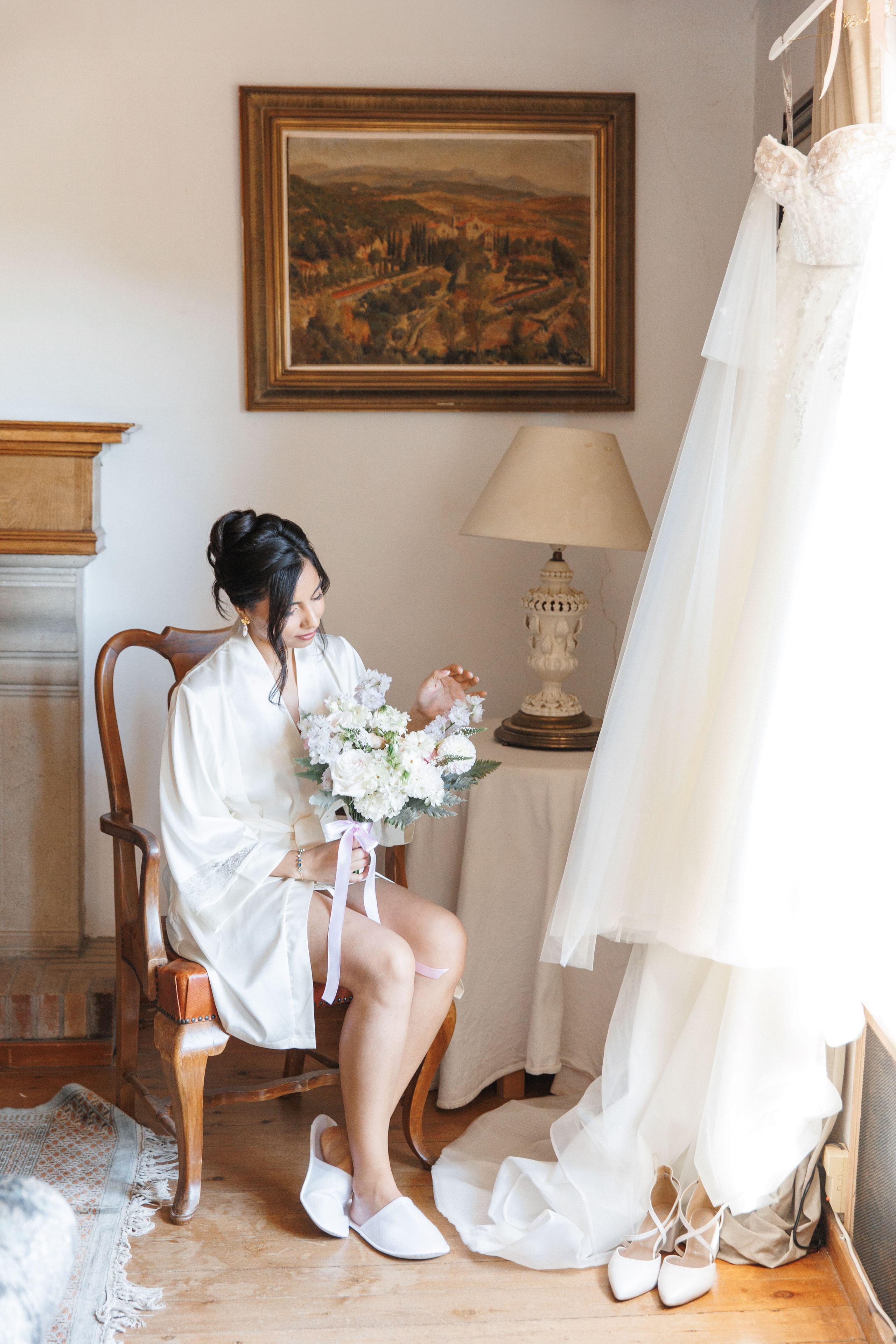 Stunning bridal portrait in the Spanish wedding venue, showcasing an elegant wedding dress and wedding details.
