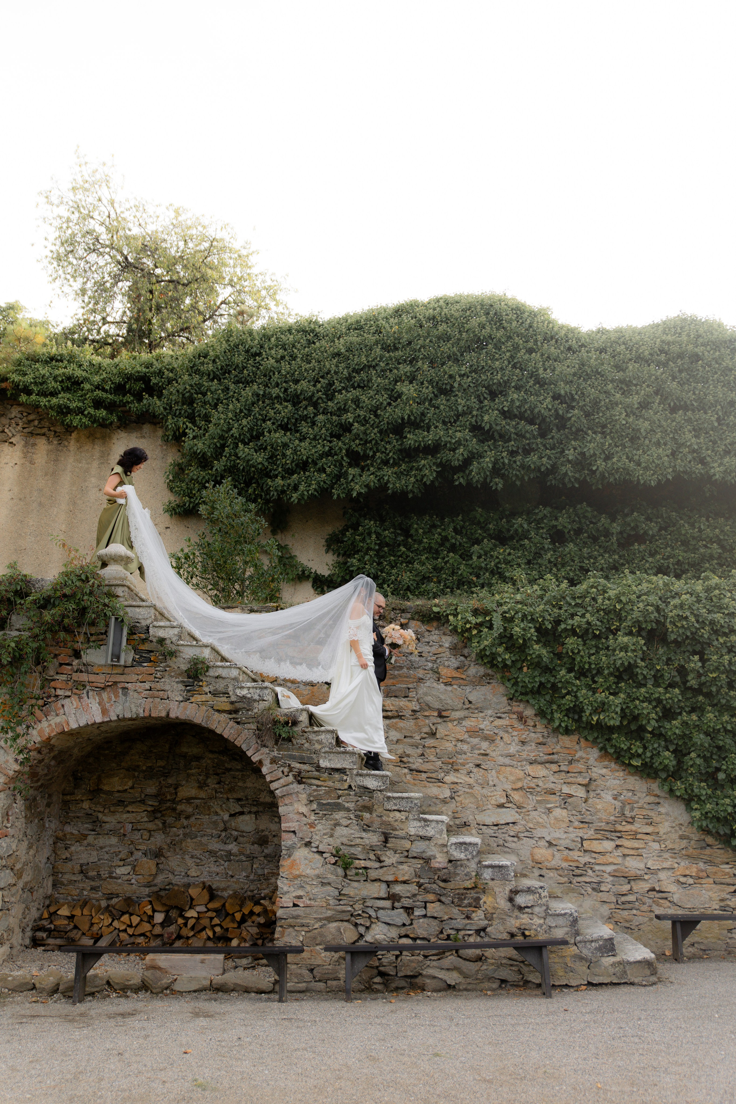 Fairytale castle wedding moment – the bride’s emotional walk down the aisle in a historic European venue.