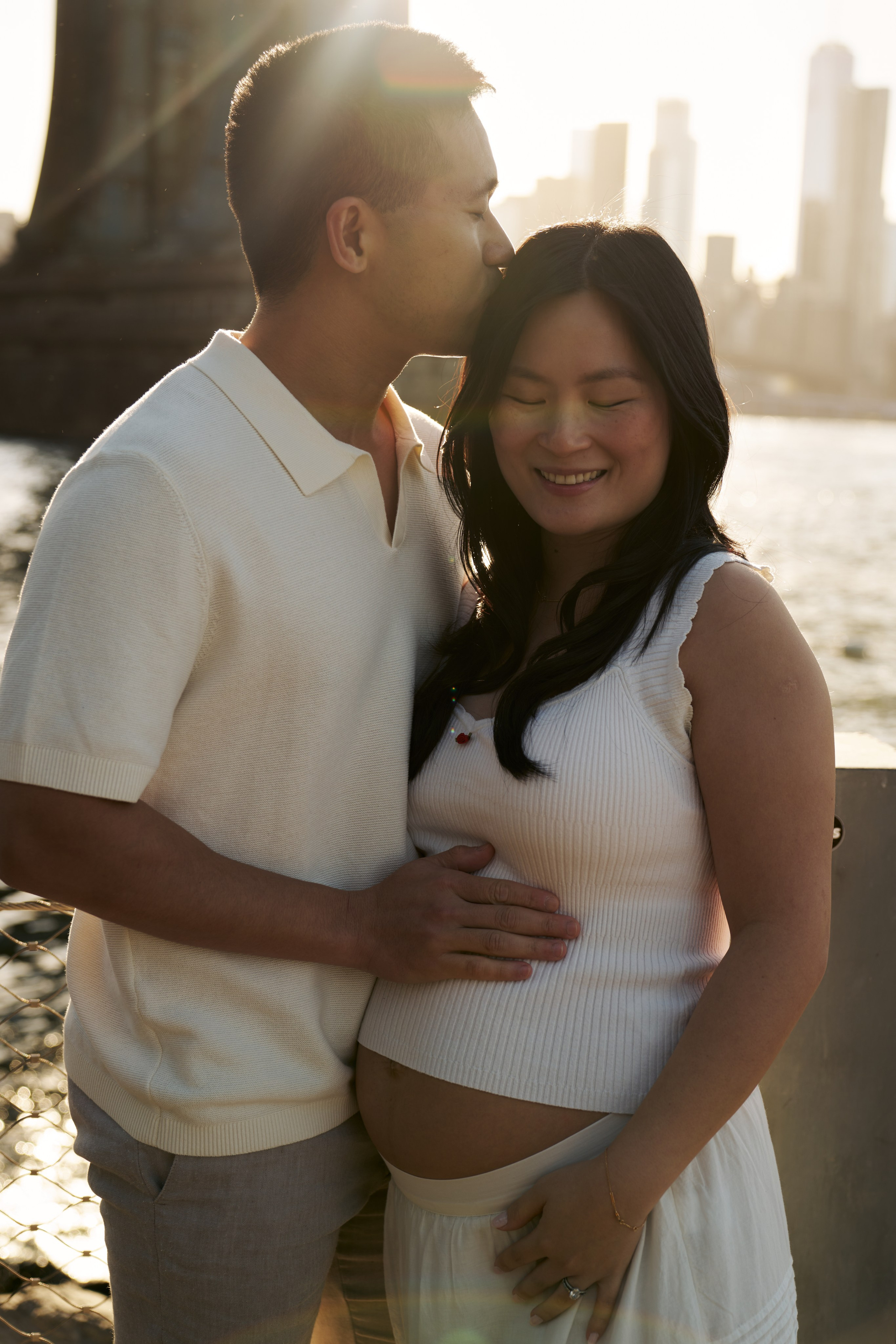 Couple mini session in Brooklyn Bridge Park NYC during sunset by New York family photographer