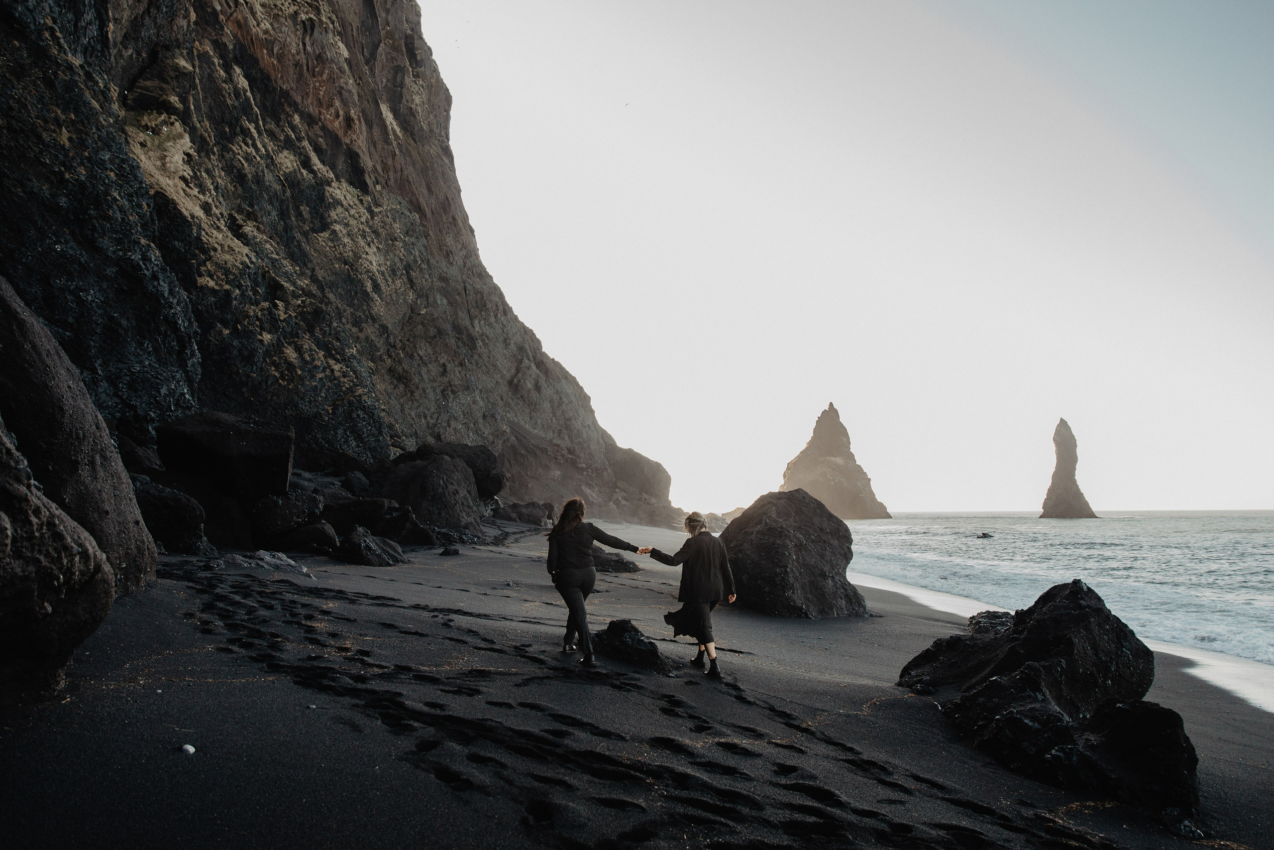 Same Sex Wedding at Iceland Black Sand Beach. Iceland elopement photographer & videographer