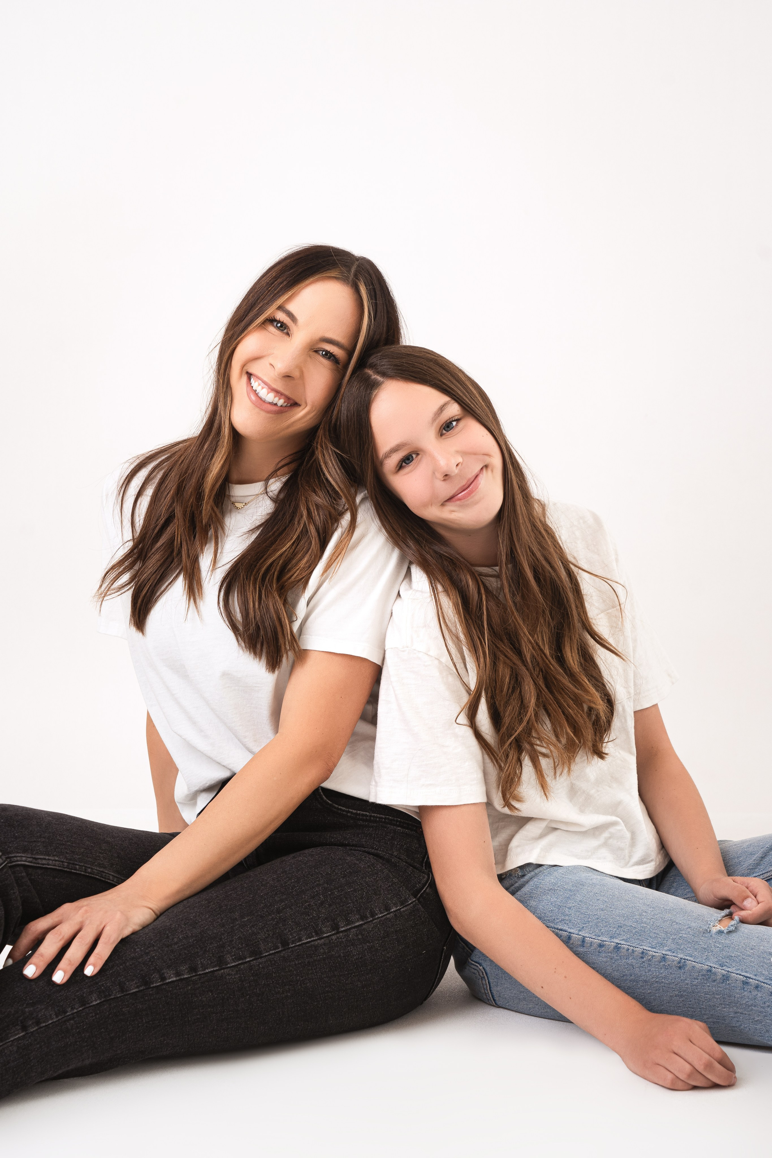 Family studio photoshoot in Santa Clarita with mom and children on neutral beige background