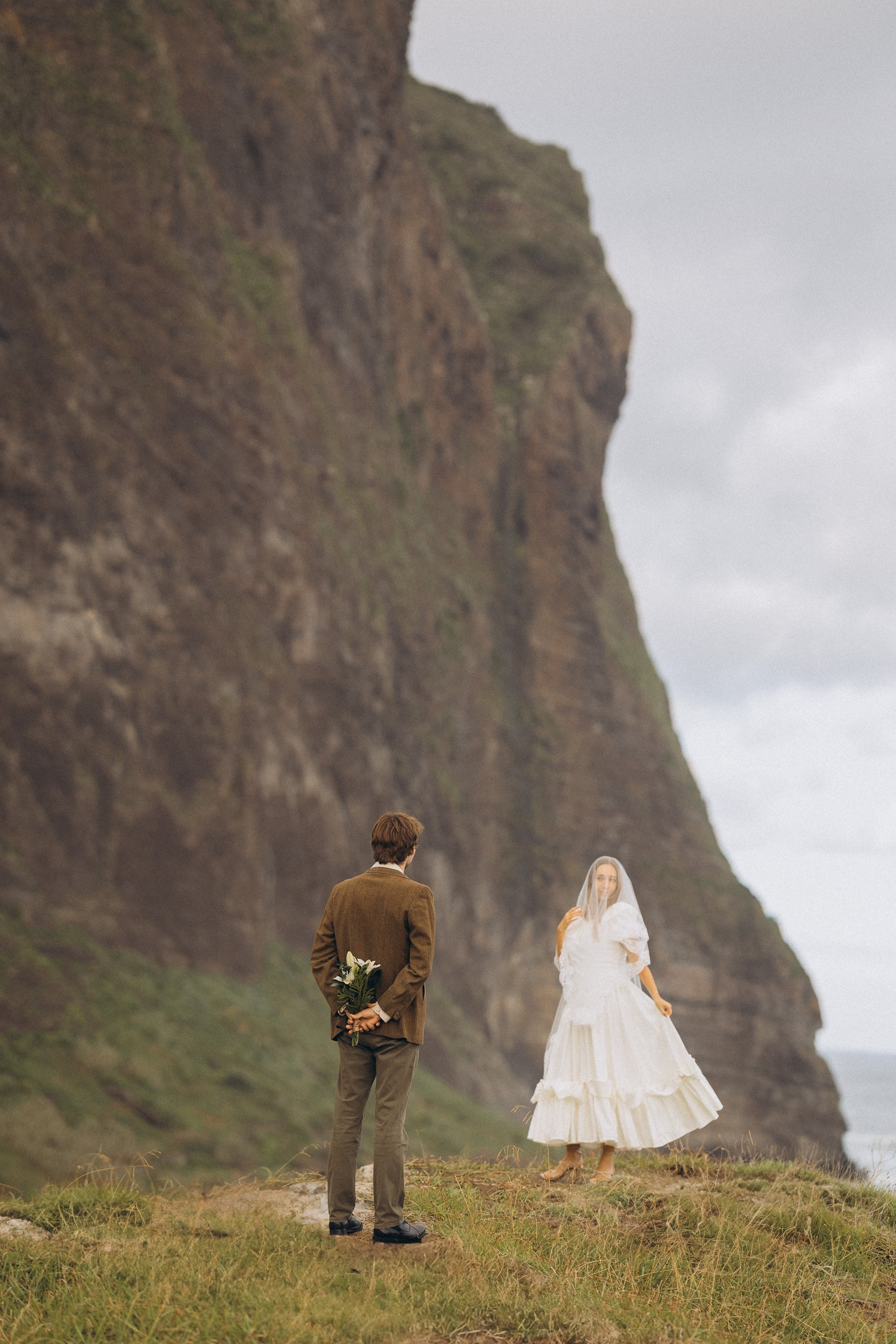 Elopement in Madeira — intimate wedding ceremony surrounded by dramatic cliffs, ocean views, and natural landscapes.
