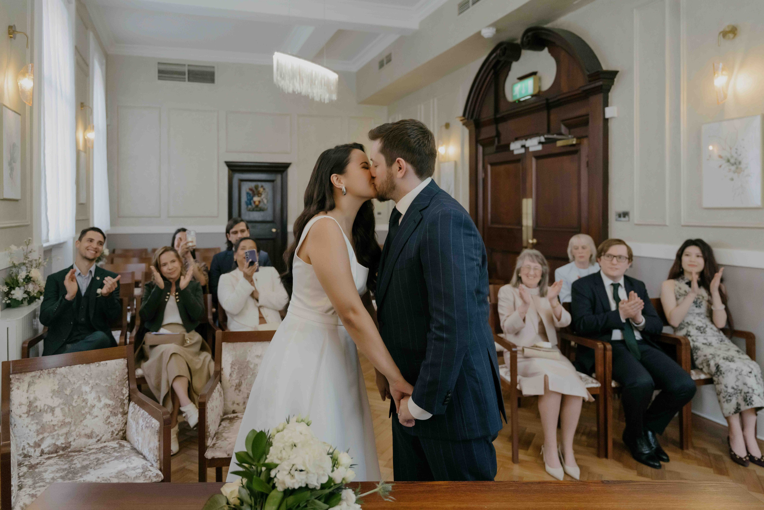 Intimate wedding at Chelsea Town Hall London, emotional ceremony moment, natural candid wedding photography